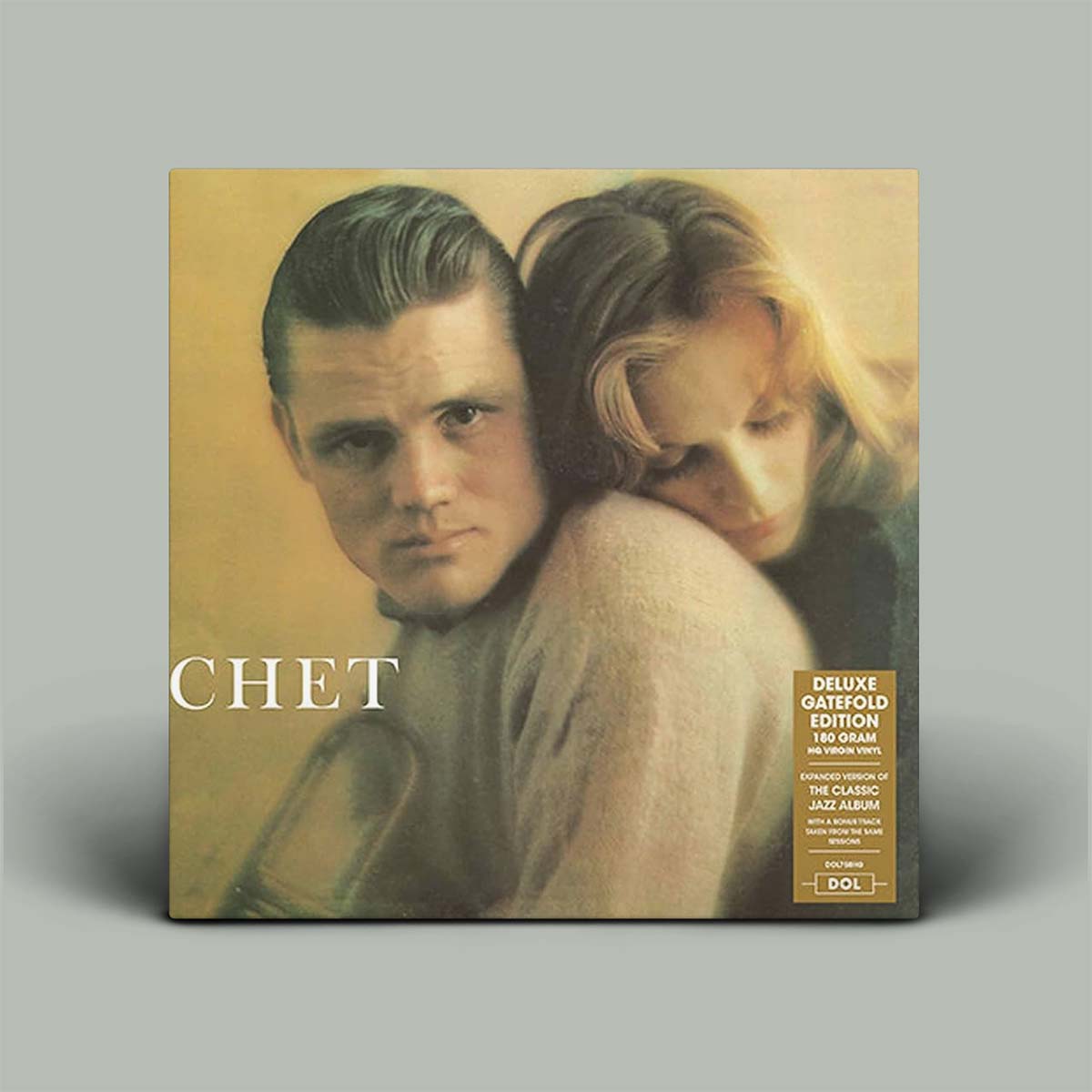 Vinyl record cover with a portrait of a man and woman on a beige background