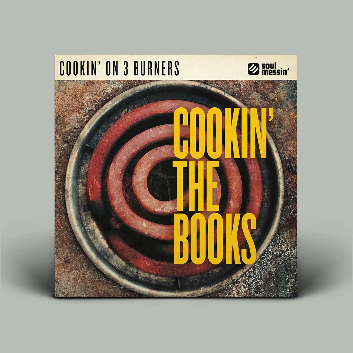 Album cover for 'Cookin' on 3 Burners: The Books' with a spiral design and text.