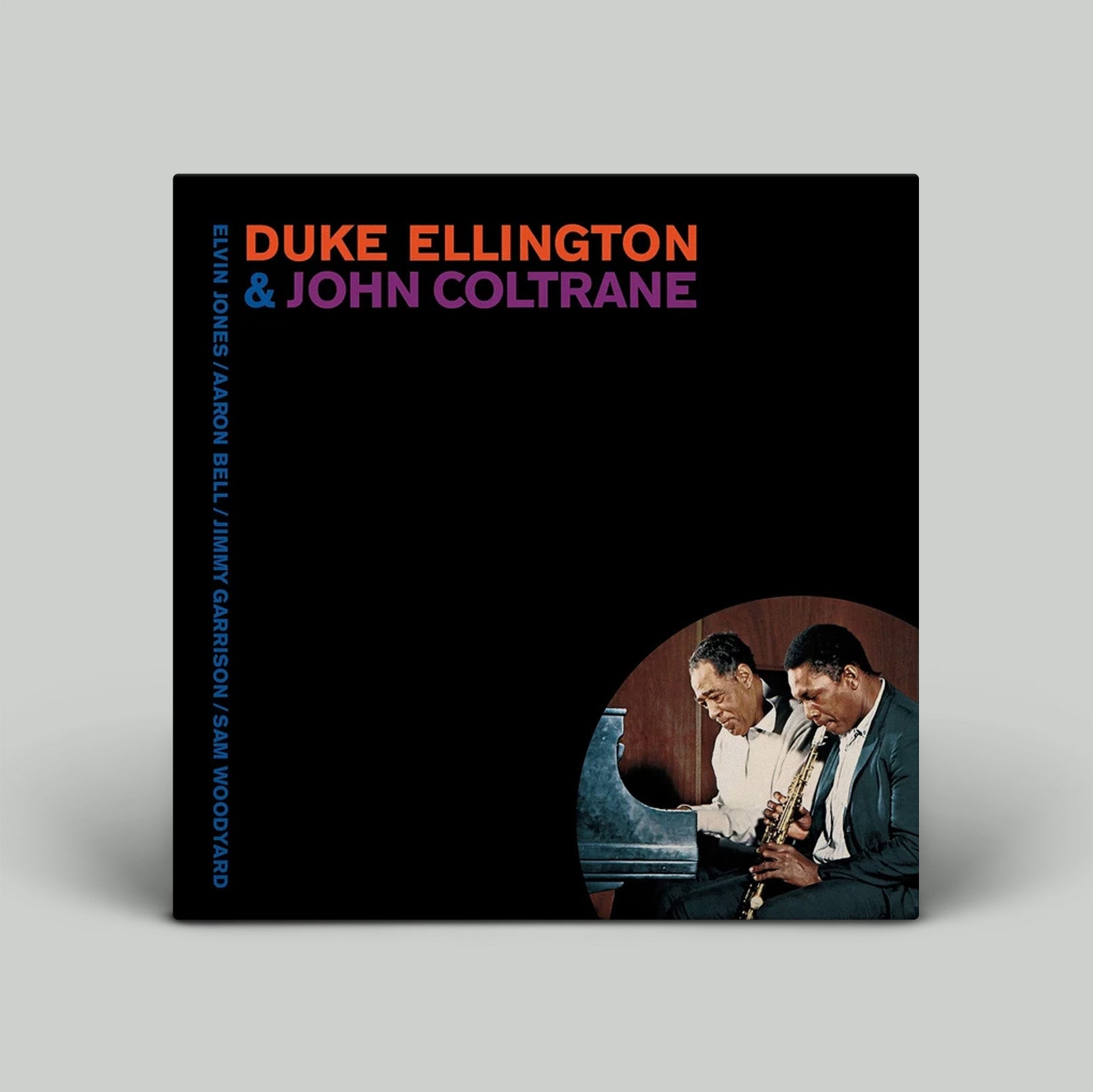 Album cover featuring Duke Ellington and John Coltrane with a piano and saxophone on a black background.
