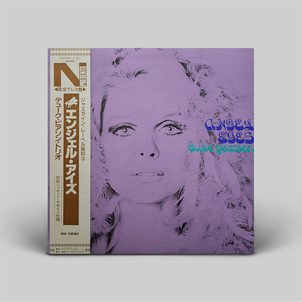 Album cover featuring a purple-toned portrait of a woman's face, with text including the title 'Angel Eyes' and the artist's name 'Duke Pearson'.