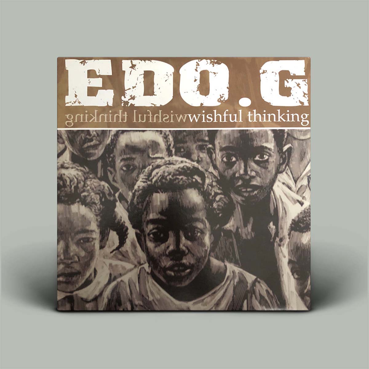 The image shows the album cover of 'Wishful Thinking' by Edo G. featuring a black and white photograph of a group of children.