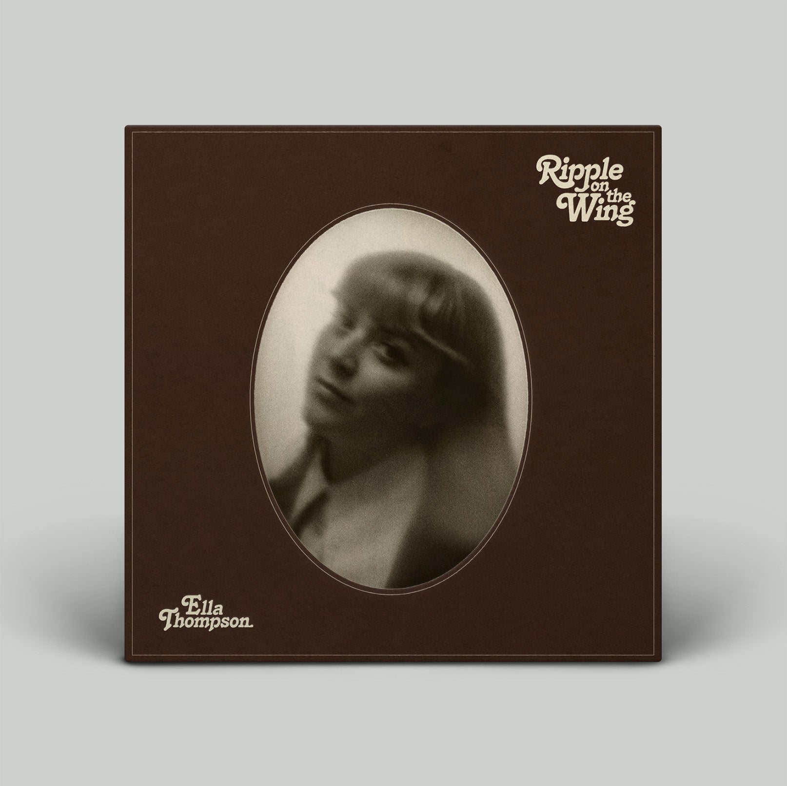 Album cover with portrait and text on a plain background