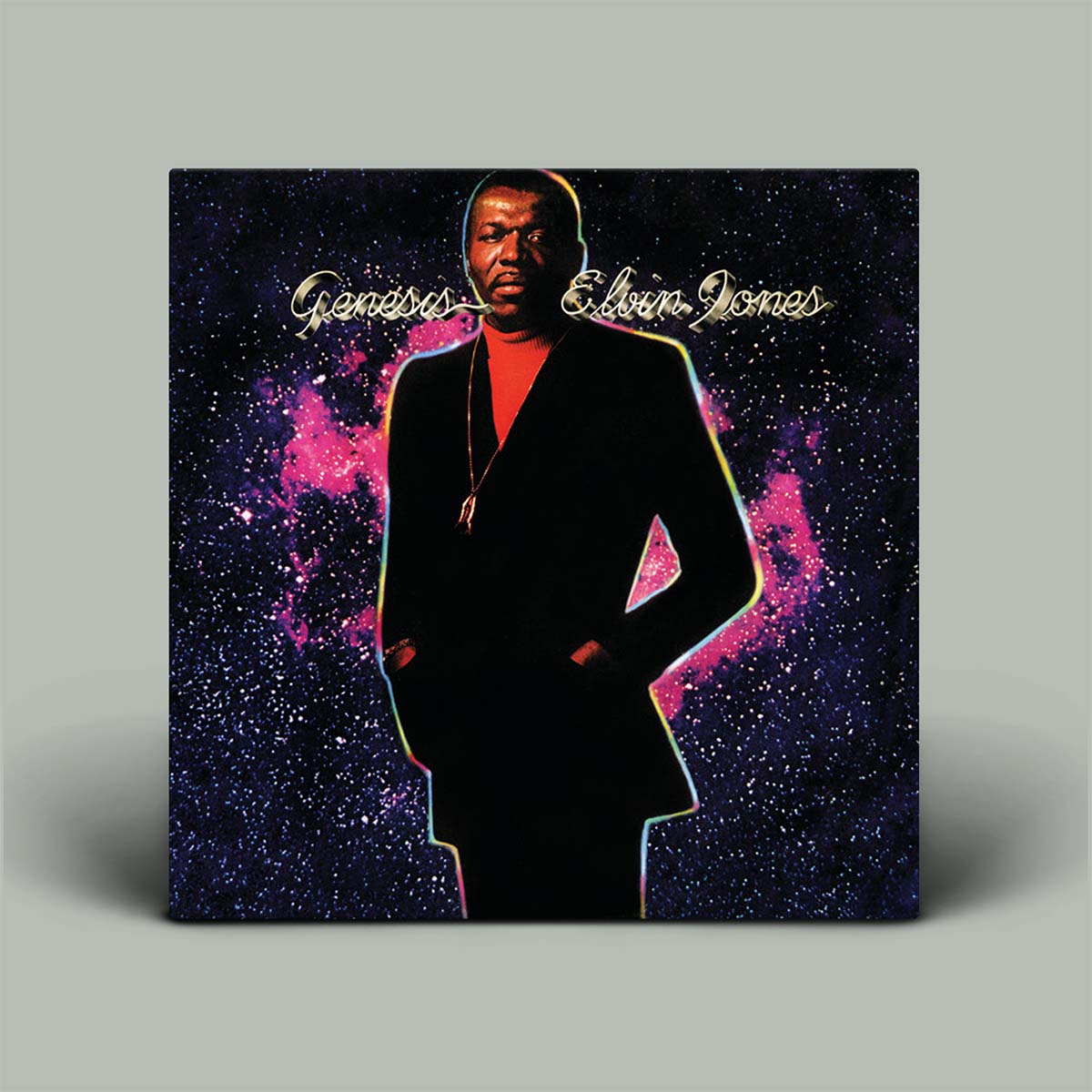 Album cover with a silhouette of a person against a starry background, featuring the text 'Genesis' and 'Elvin Jones'.