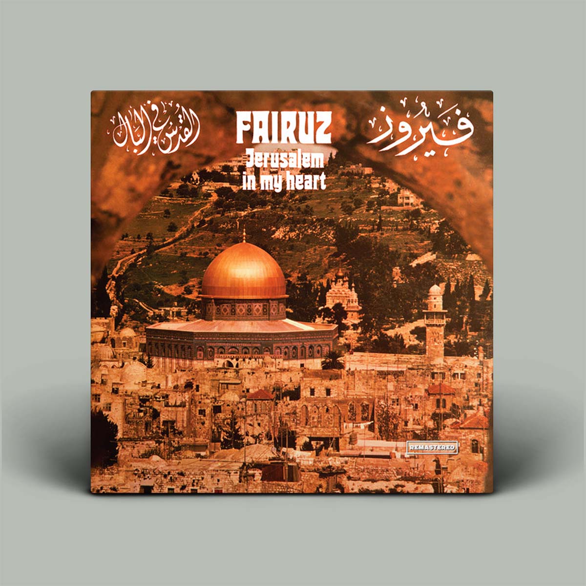 Album cover with a domed structure and text on a gray background
