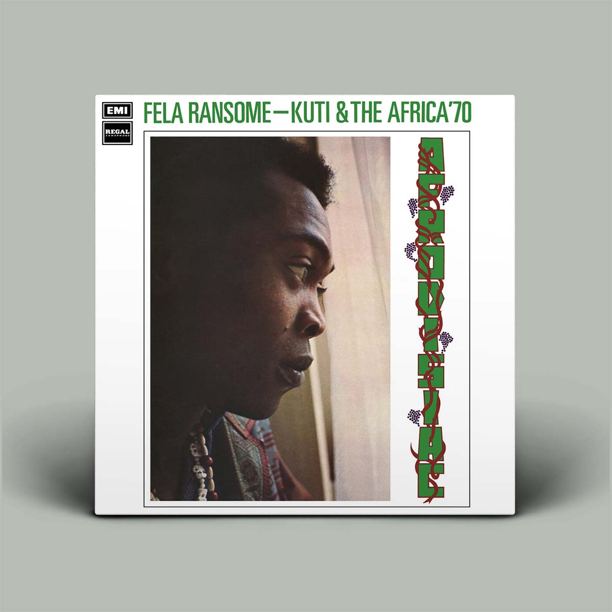 Fela Ransome - Kuti & The Africa '70 vinyl record album cover, featuring a profile portrait of Fela Ransome with green and red text on a white background, shown on a gray background.