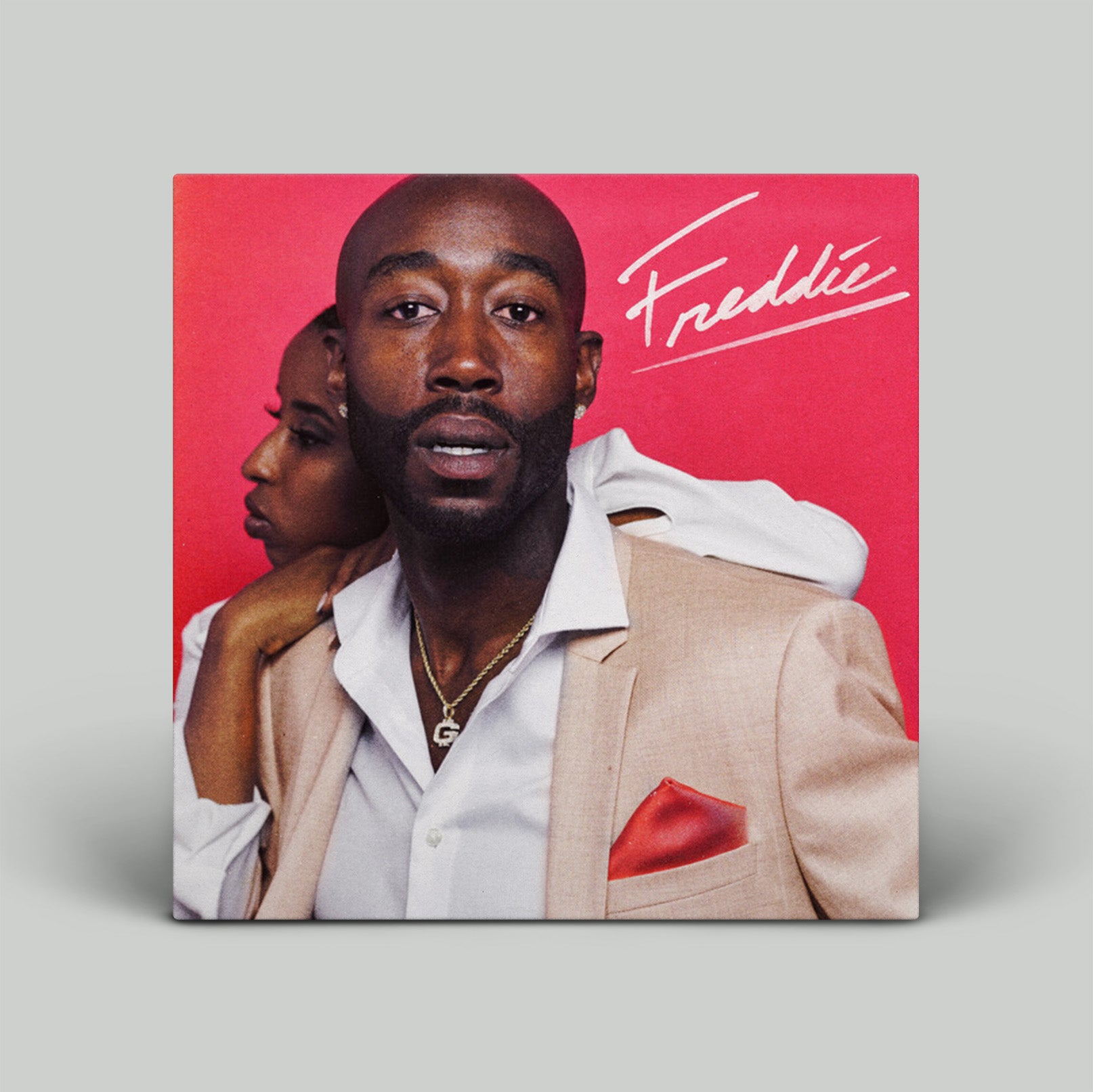 Album cover with a man and woman on a red background, featuring the name 'Freddie'.