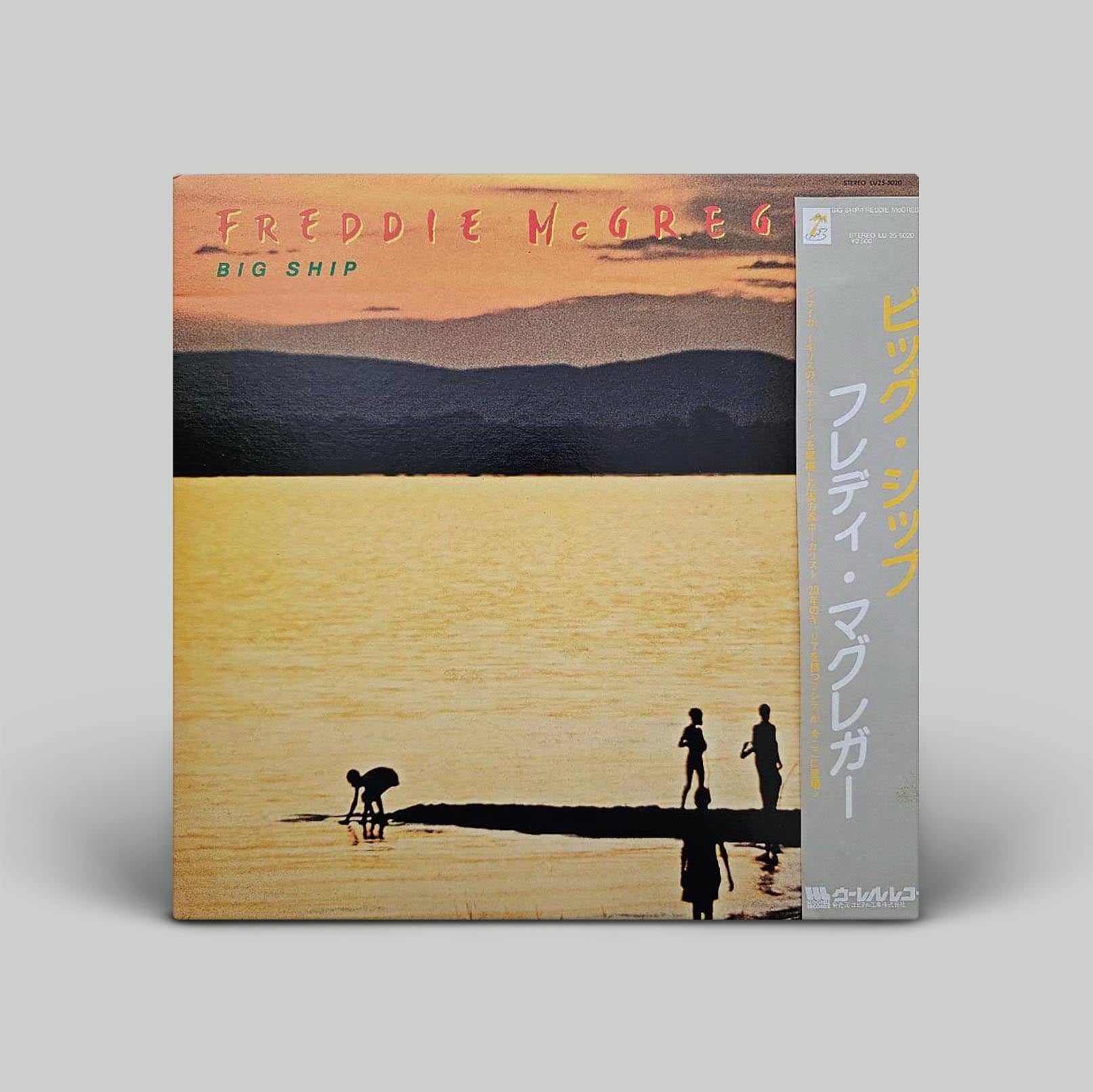 Album cover for 'Big Ship' by Freddie McGregor featuring a serene lake scene at sunset with a silhouette of three figures on the cover.