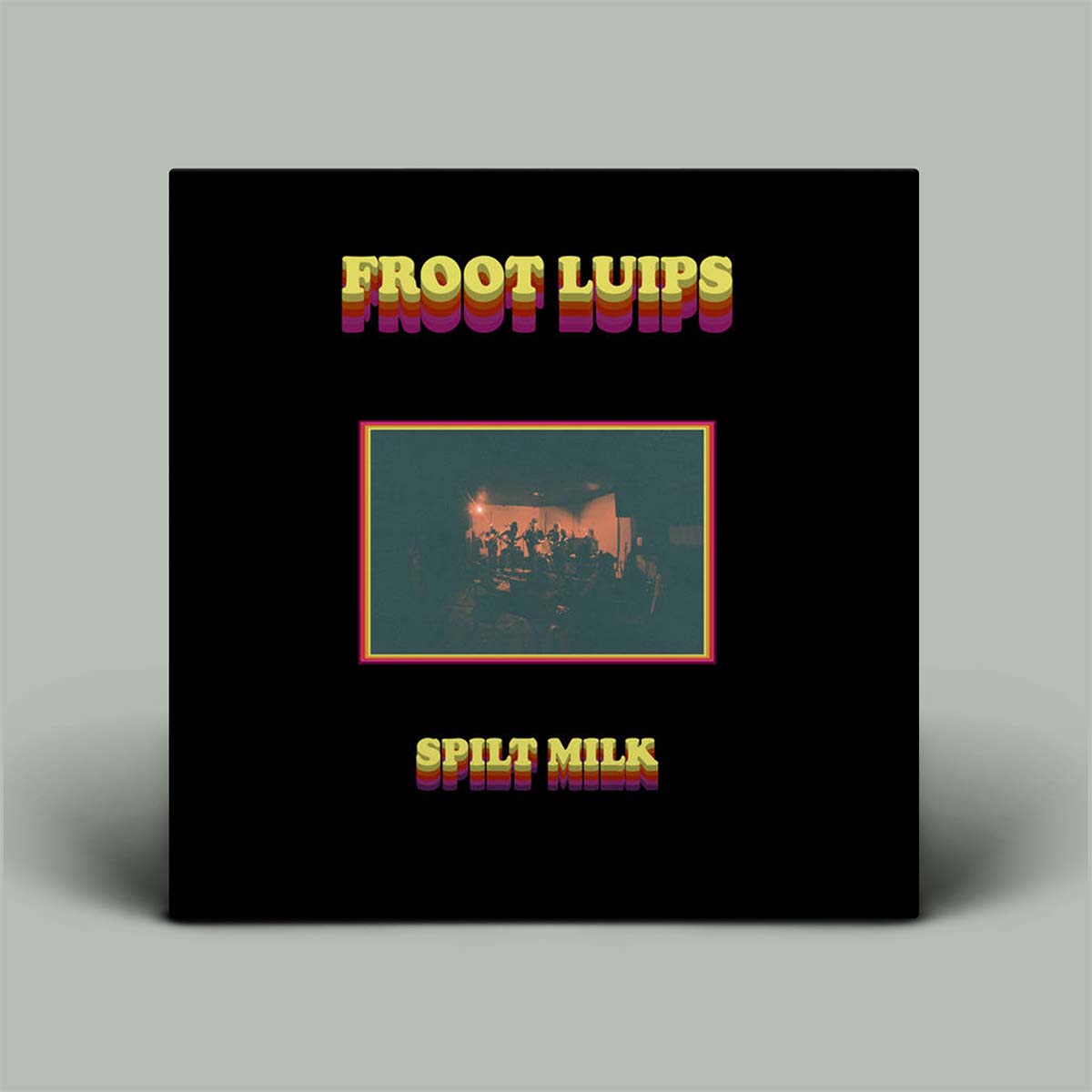 Vinyl record cover with 'Froot Luips' and 'Split Milk' text on a black background