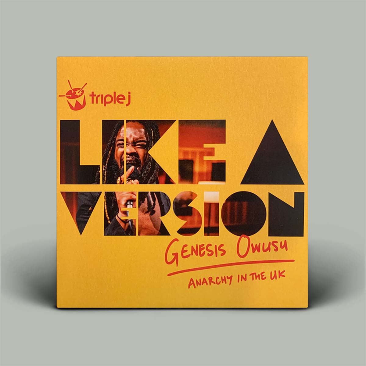 Album cover for 'Like a Version' by Genesis Owusu with 'triple j' branding on a gray background.