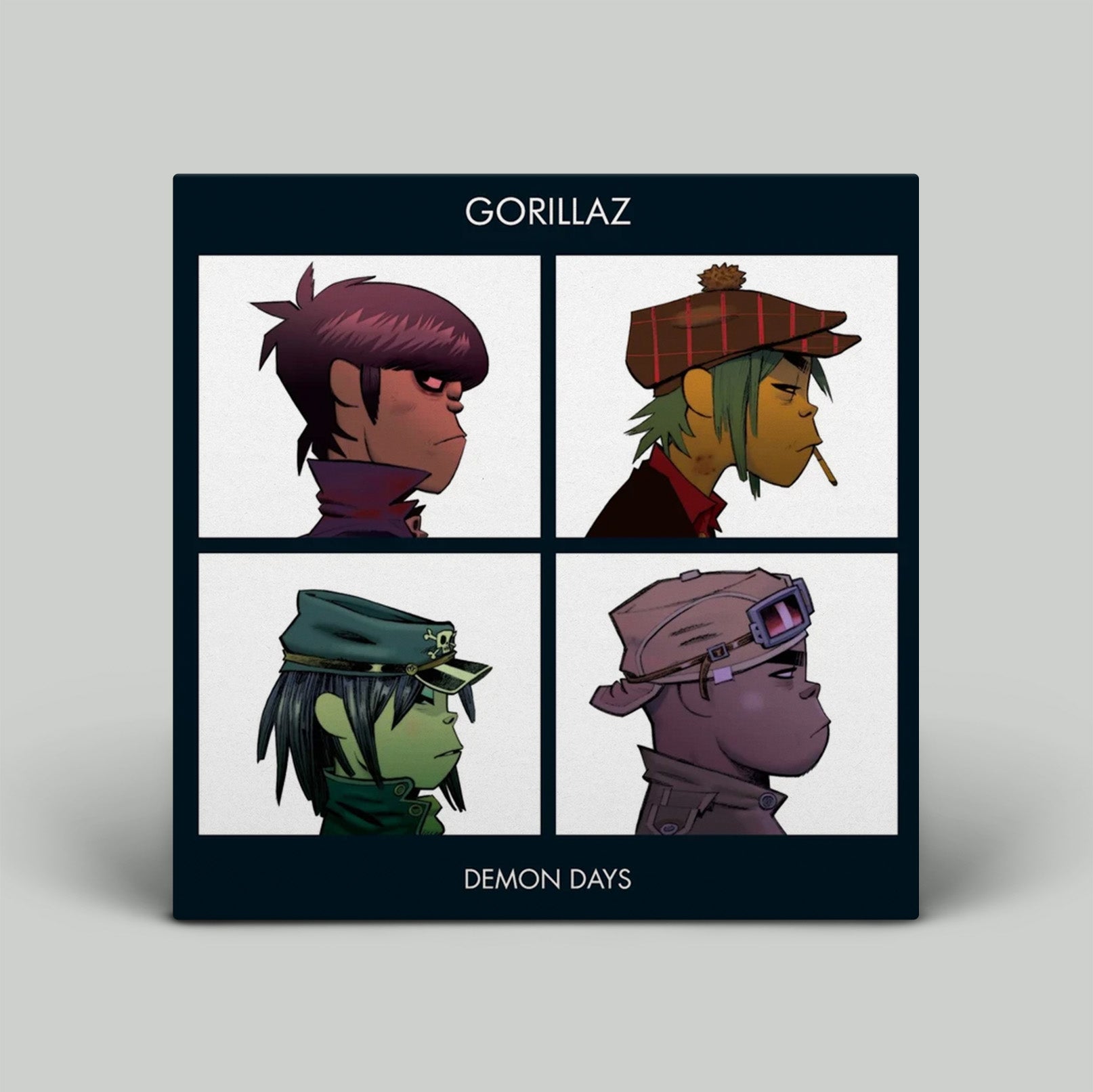 Gorillaz album cover for 'Demon Days' with four character portraits on a gray background