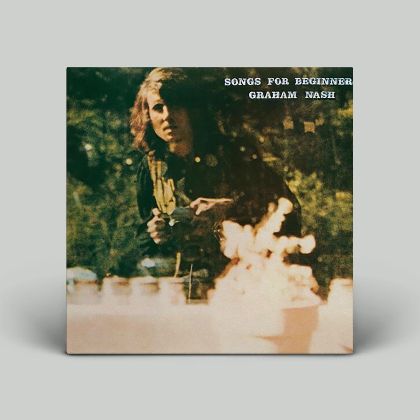 Album cover showing man with green background.