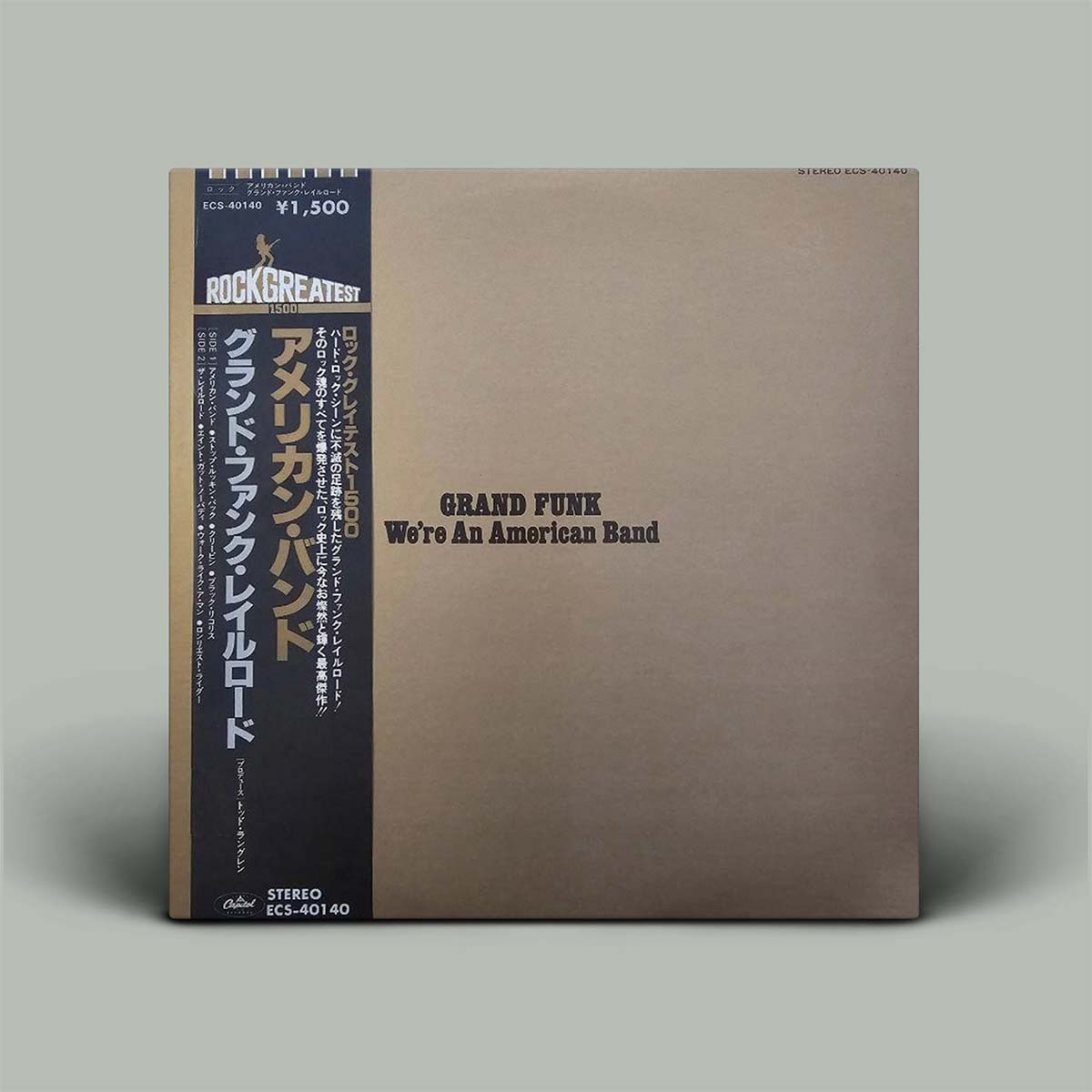 A used vinyl record sleeve for the album 'We're An American Band' by Grand Funk. The sleeve is primarily beige with text and graphics indicating the album title, artist, and other details.