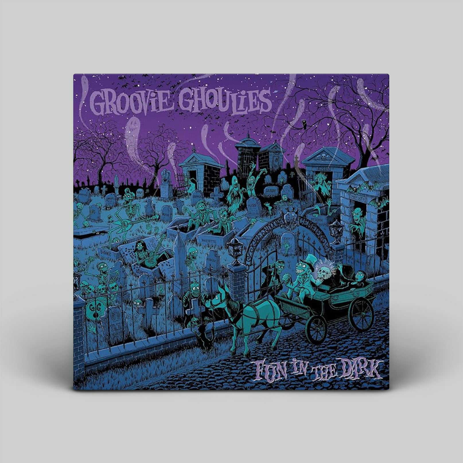Album cover for 'Groovie Ghoulies' with a spooky graveyard scene and horse-drawn carriage.