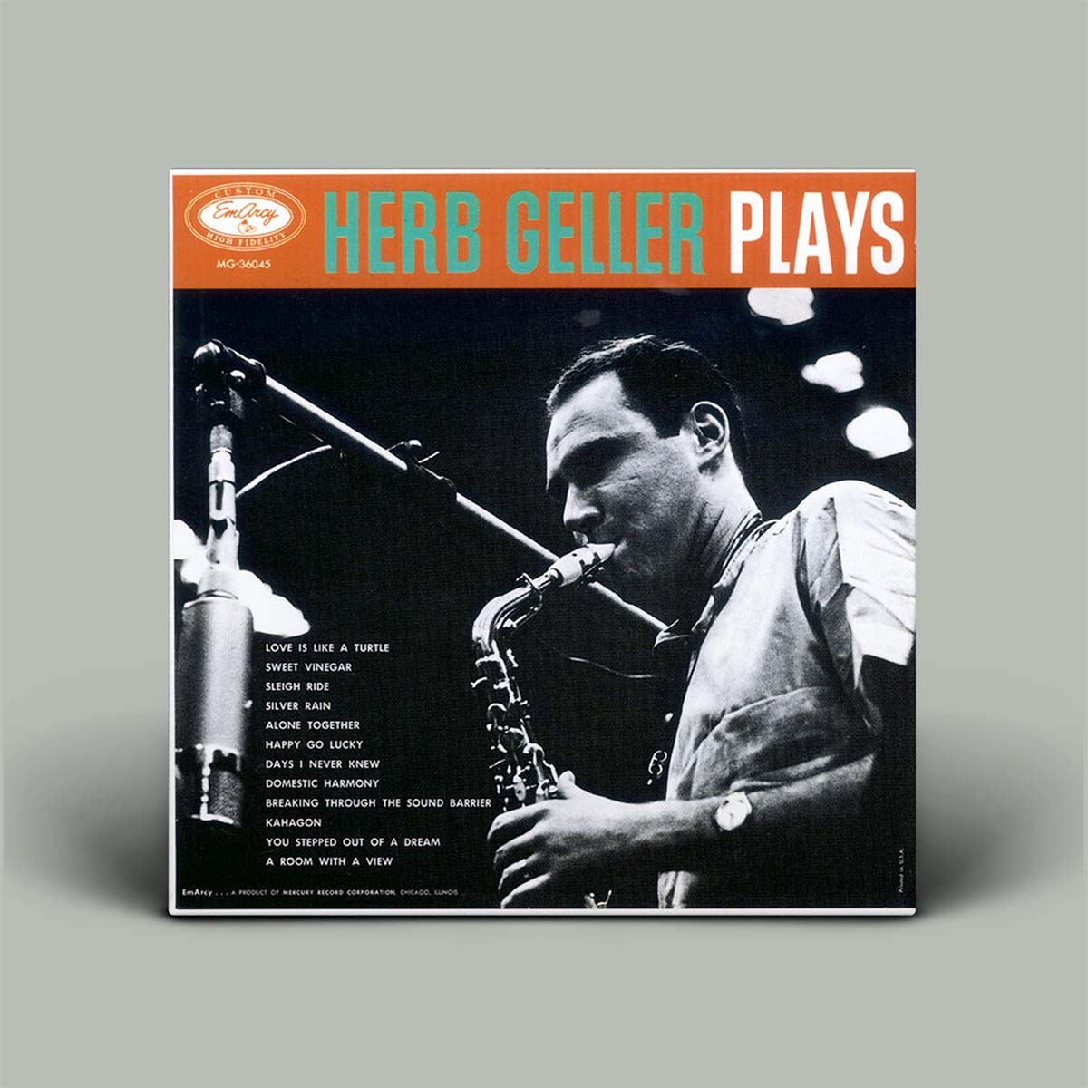 Album cover of 'Herb Geller Plays' featuring a saxophonist playing with text on a gray background