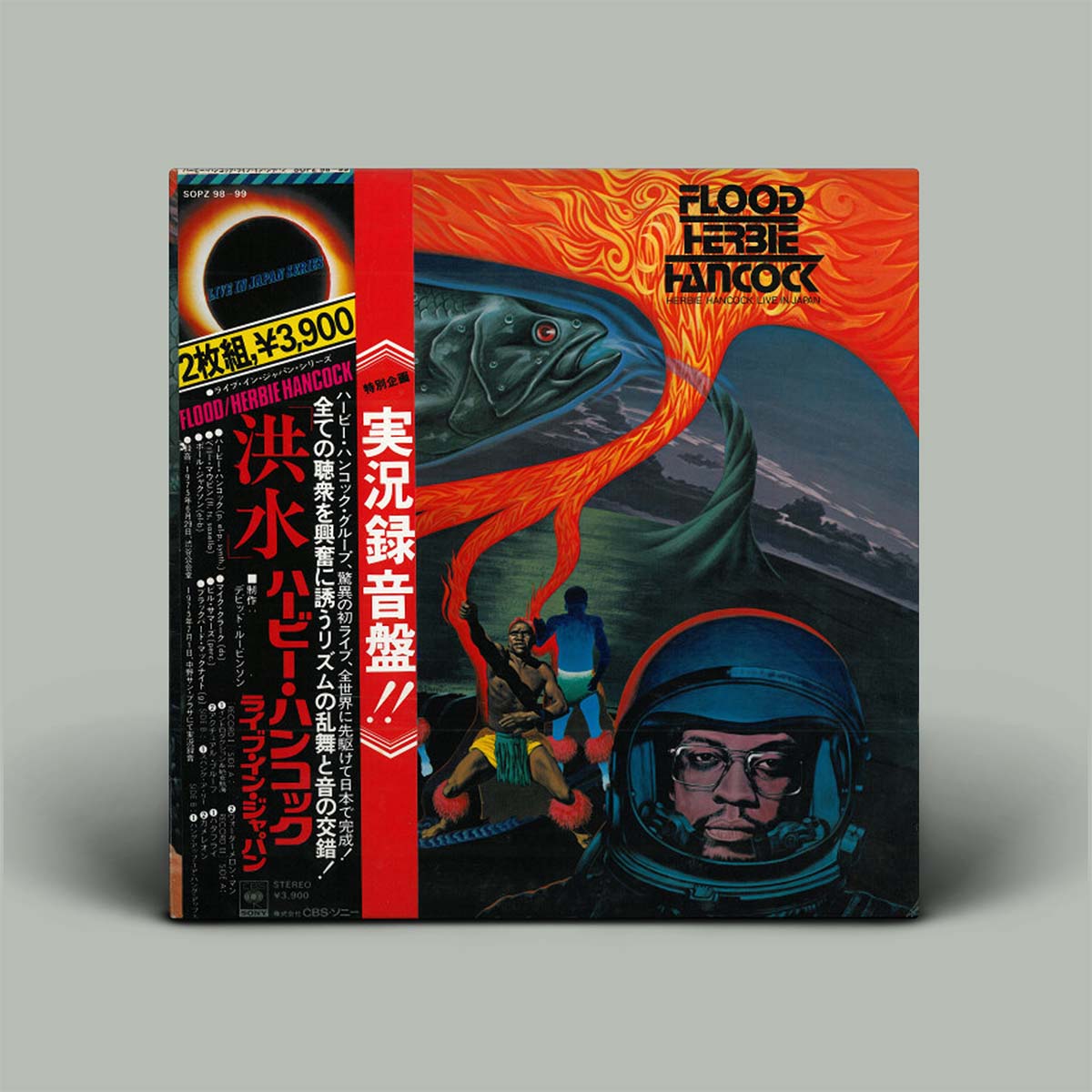 Vinyl record cover with a futuristic design featuring an astronaut and a fish, on a gray background.