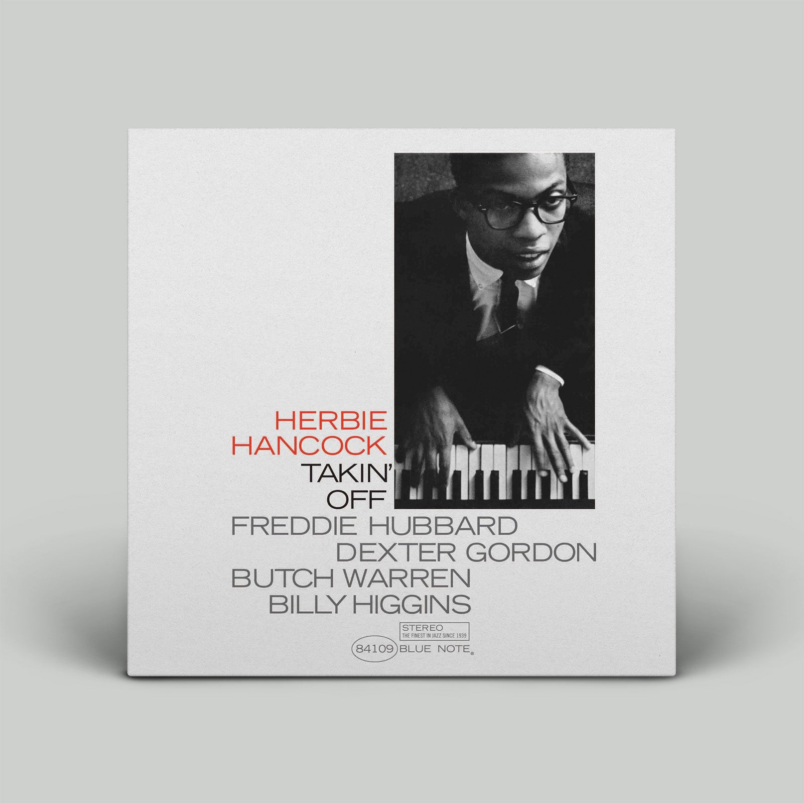 Album cover featuring a black and white portrait of a musician playing piano with text about musicians involved.
