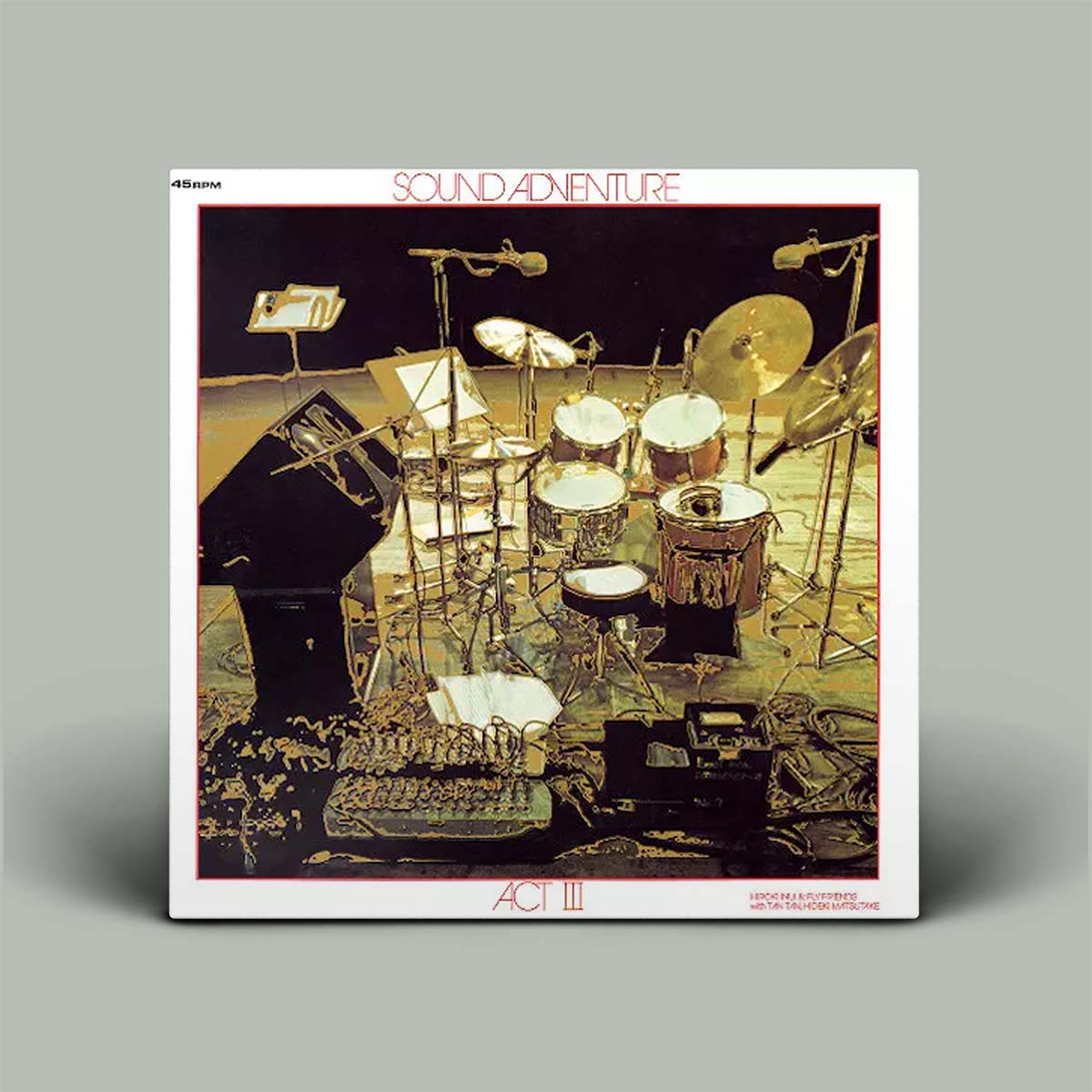Album cover with a drum set and musical instruments on a gray background