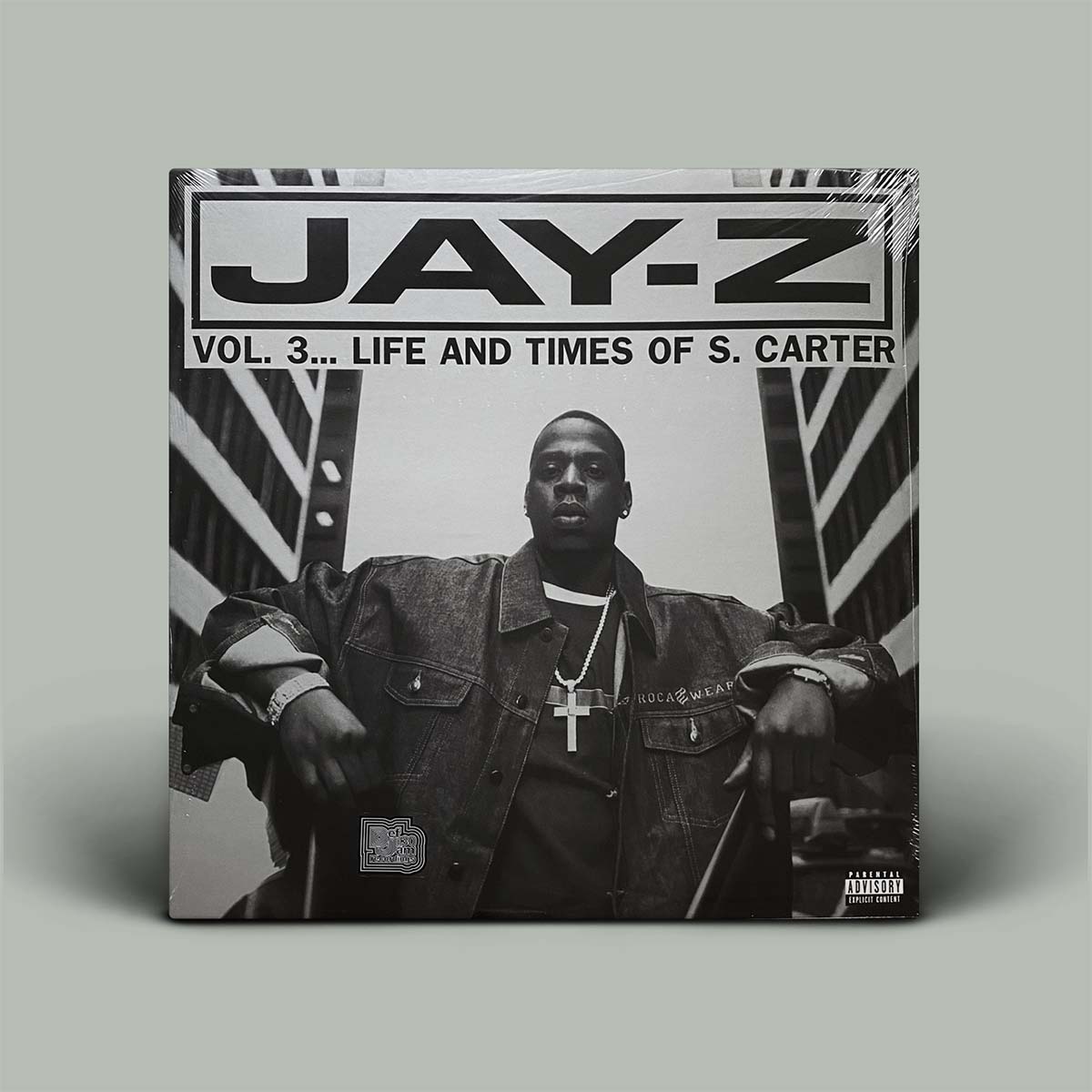 Album cover of 'Jay-Z Vol. 3... Life and Times of S. Carter' with a black and white photo of Jay-Z.