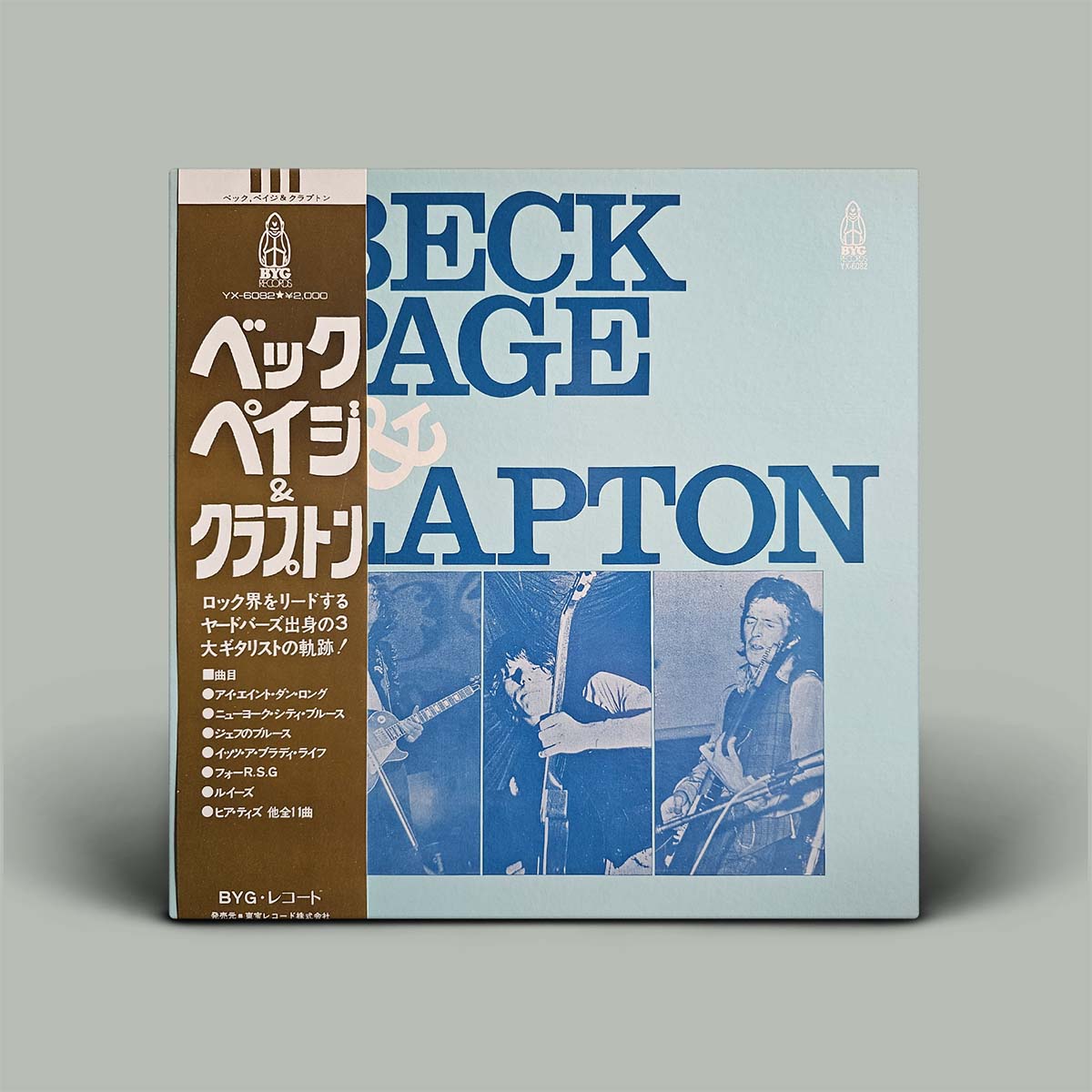 Album cover with text and images of musicians on a gray background