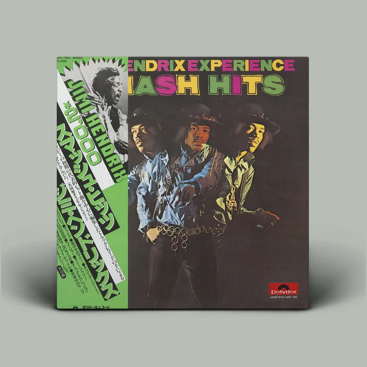 Vinyl record cover for 'Hendrix Experience Flash Hits' with colorful text and images of a person.