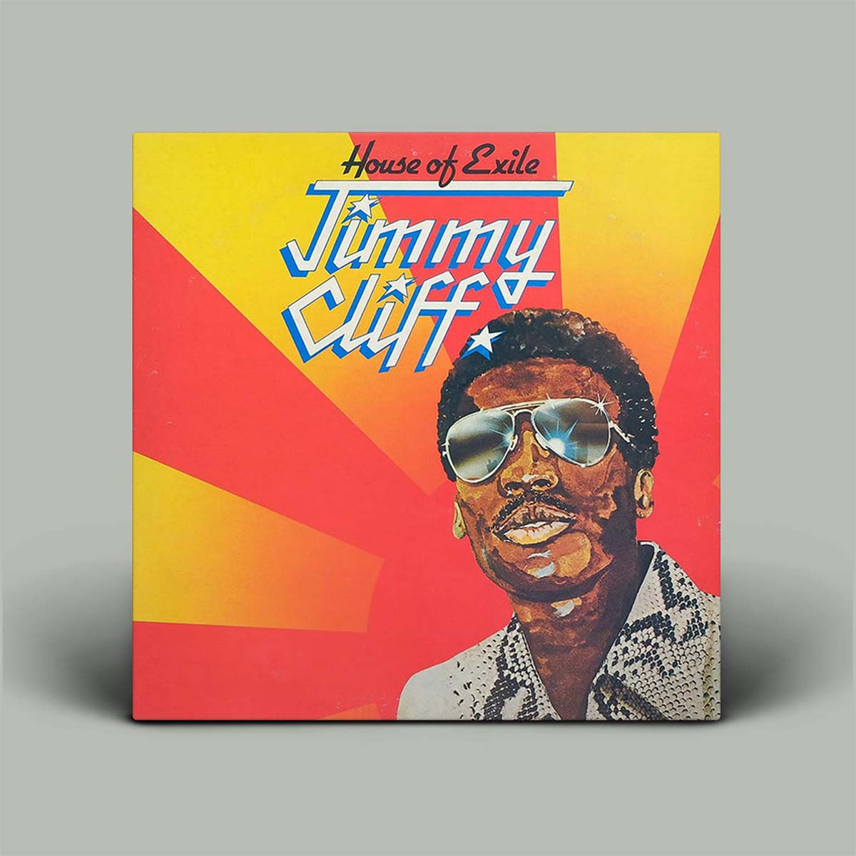 Album cover of 'House of Exile' by Jimmy Cliff with a colorful design and portrait of the artist.