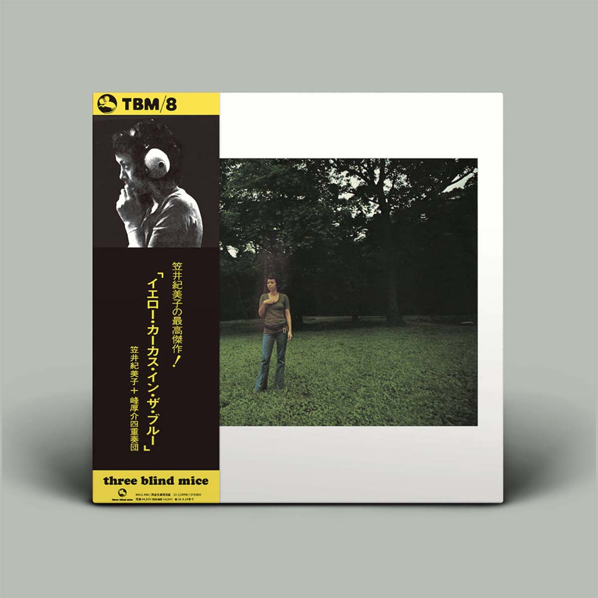 Album cover with a person in a field and text on a gray background