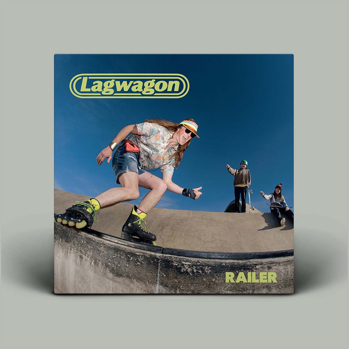 Album cover for Lagwagon's 'RAILER' with a person on rollerblades and two others in the background.