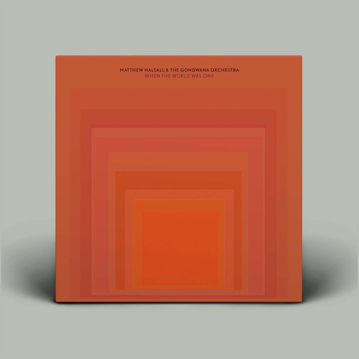 A square album cover for Matthew Malsall & The Dominiana Orchestra's 'When The World Was One', featuring a minimalist design of nested orange and red concentric squares on a light gray background.