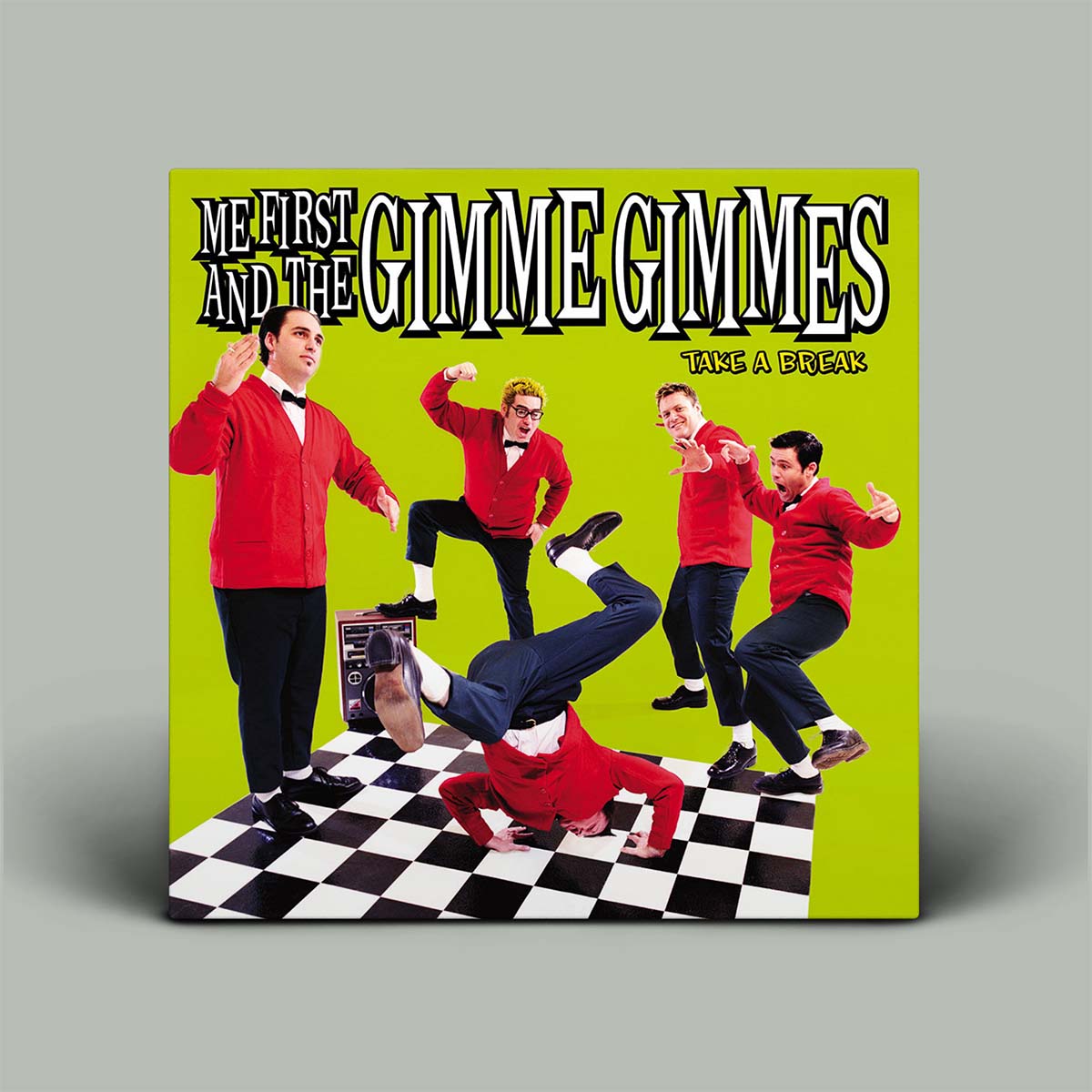 Album cover for 'Me First and the Gimme Gimmes' featuring five band members on a checkered floor with a green background.