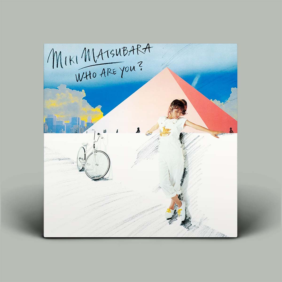 Miki Matsubara 'Who Are You?' vinyl record cover art, featuring a stylized illustration of a woman in a white outfit on a snowy ground with a bicycle and a pink-and-blue geometric background.