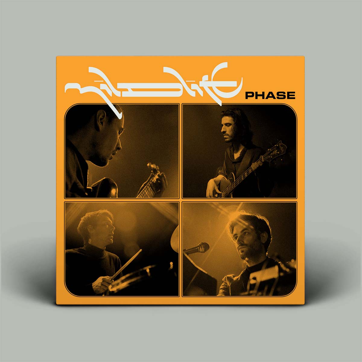 Album cover with four framed portraits of musicians and the title 'Phase'.