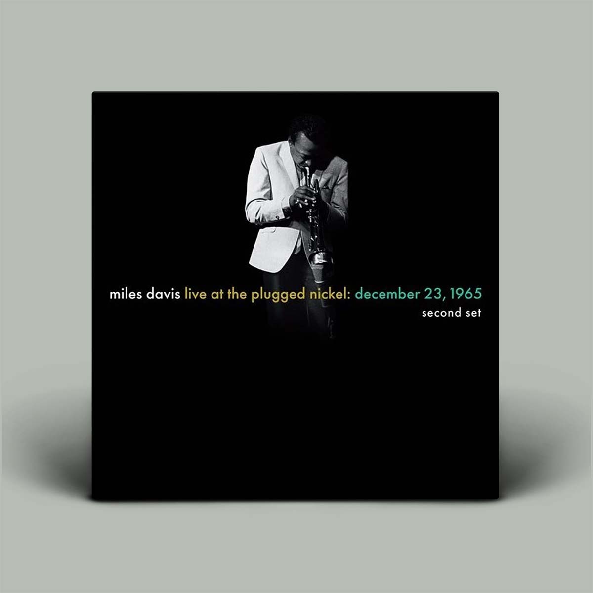 Black album cover with photo of Miles Davis playing trumpet.