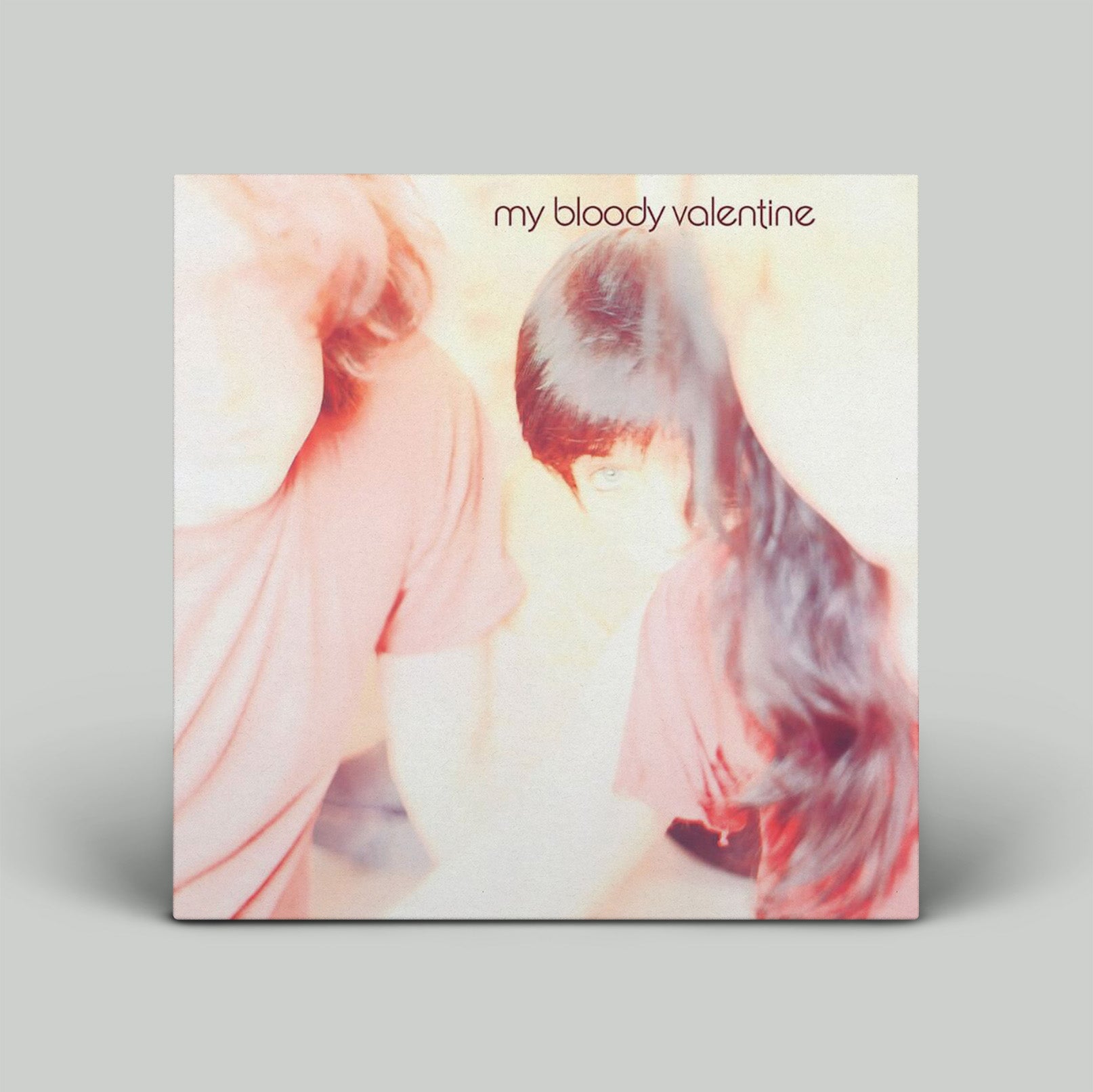 Album cover with 'my bloody valentine' text and abstract design on a gray background