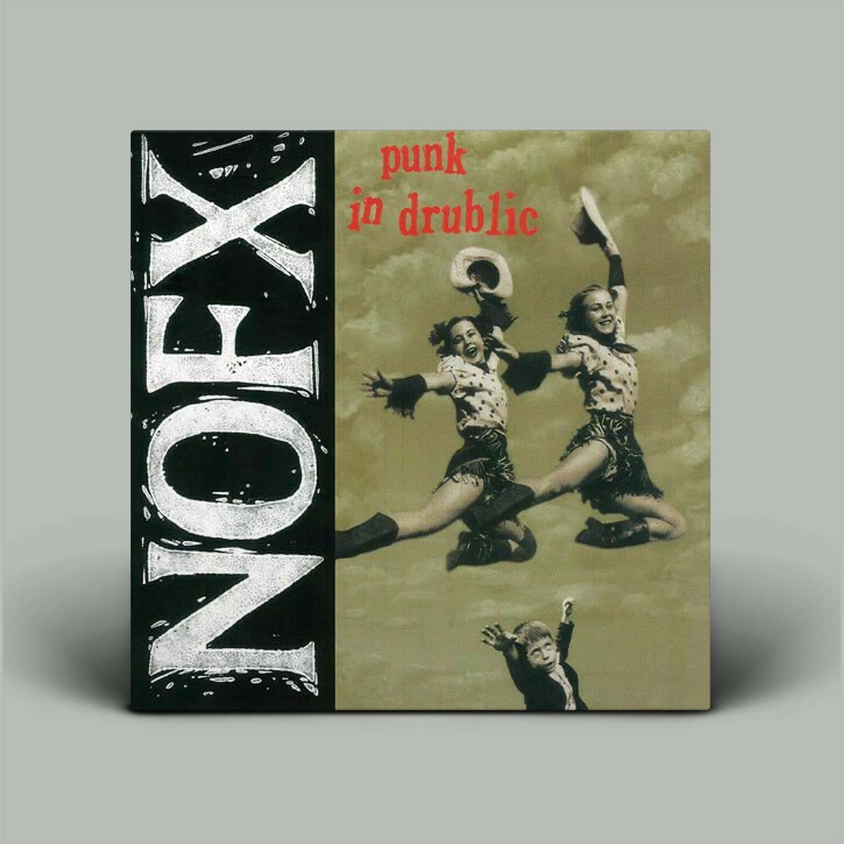 Album cover with 'NOFX' on the left and 'punk in drublic' on the right, featuring a vintage-style image of two people dancing.