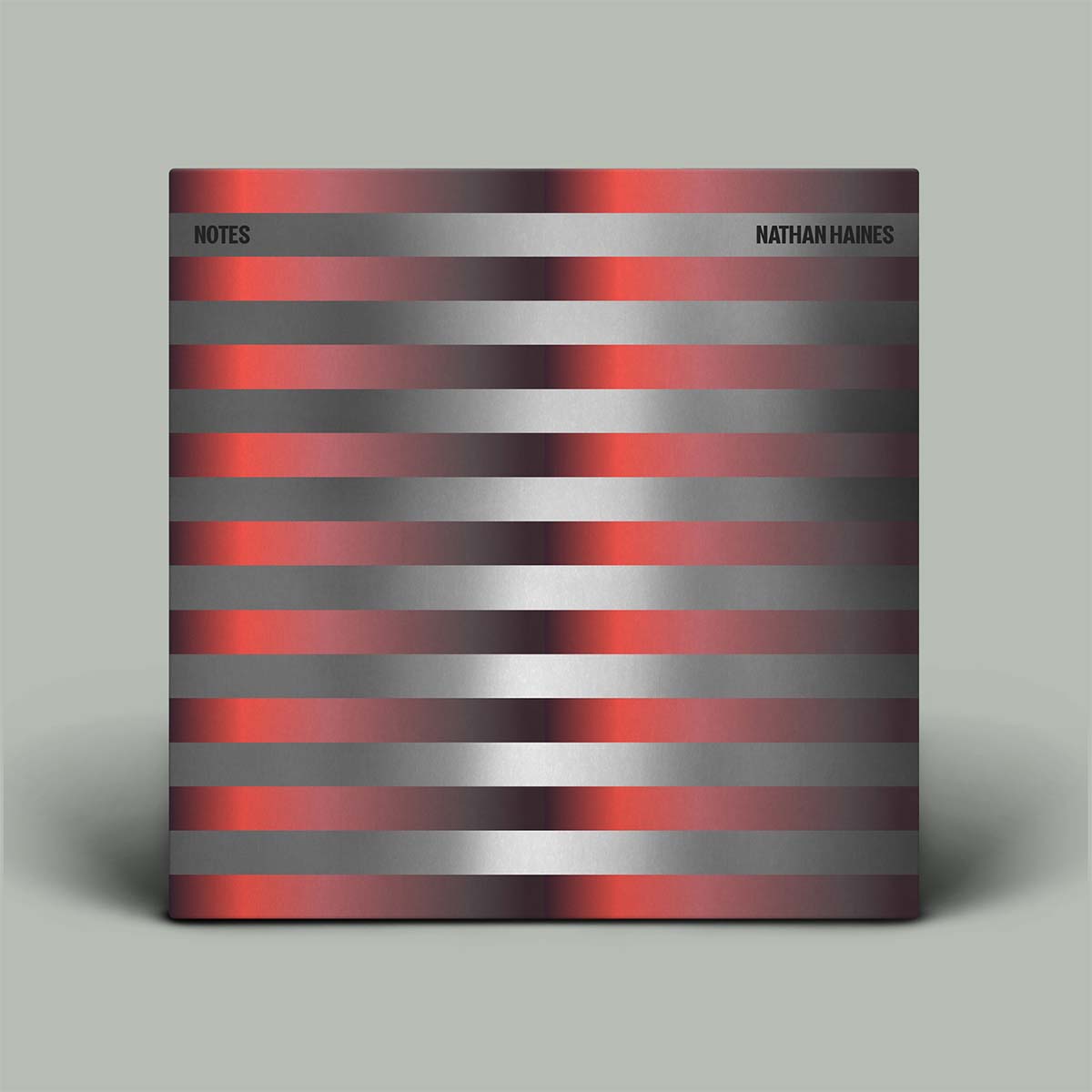 Album cover with red and gray striped cover on a light gray background