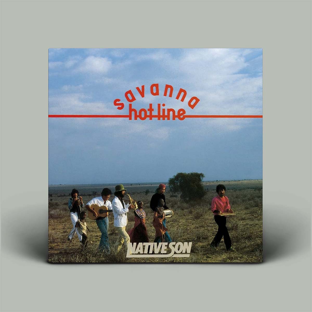 A square album cover for 'savanna hotline' by Native Son, displayed against a neutral gray background. The cover art features a photograph of a group of people walking across an open grassy landscape under a blue sky, with the title 'savanna hotline' in red text and the band name 'NATIVE SON' at the bottom.