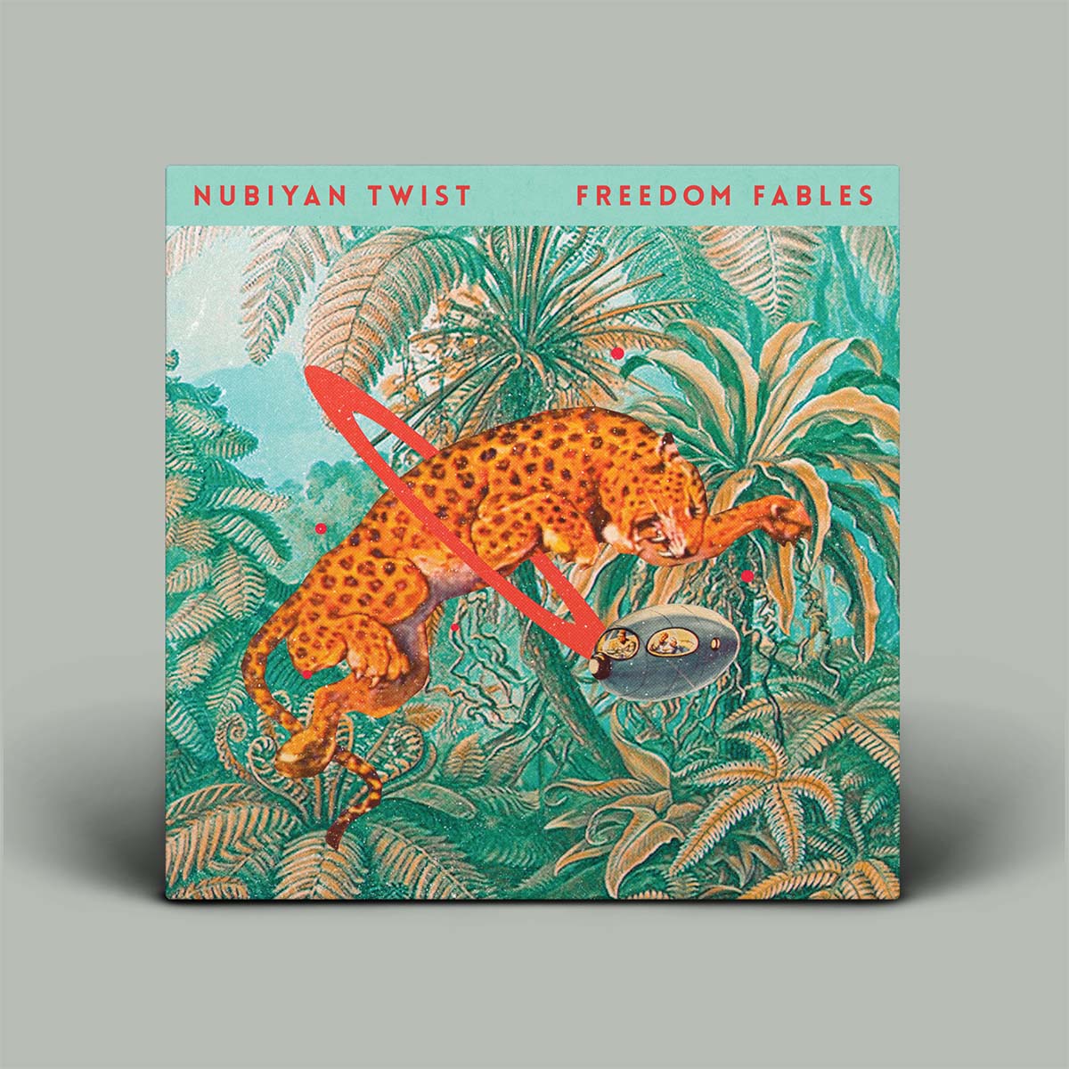 Album cover with a leopard and jungle design, featuring the text 'Nubiyan Twist' and 'Freedom Fables'.