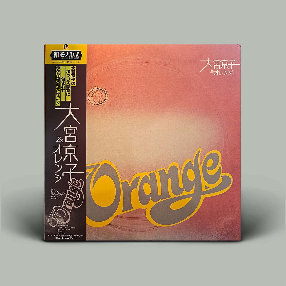 Album cover with orange colour and yellow writing.