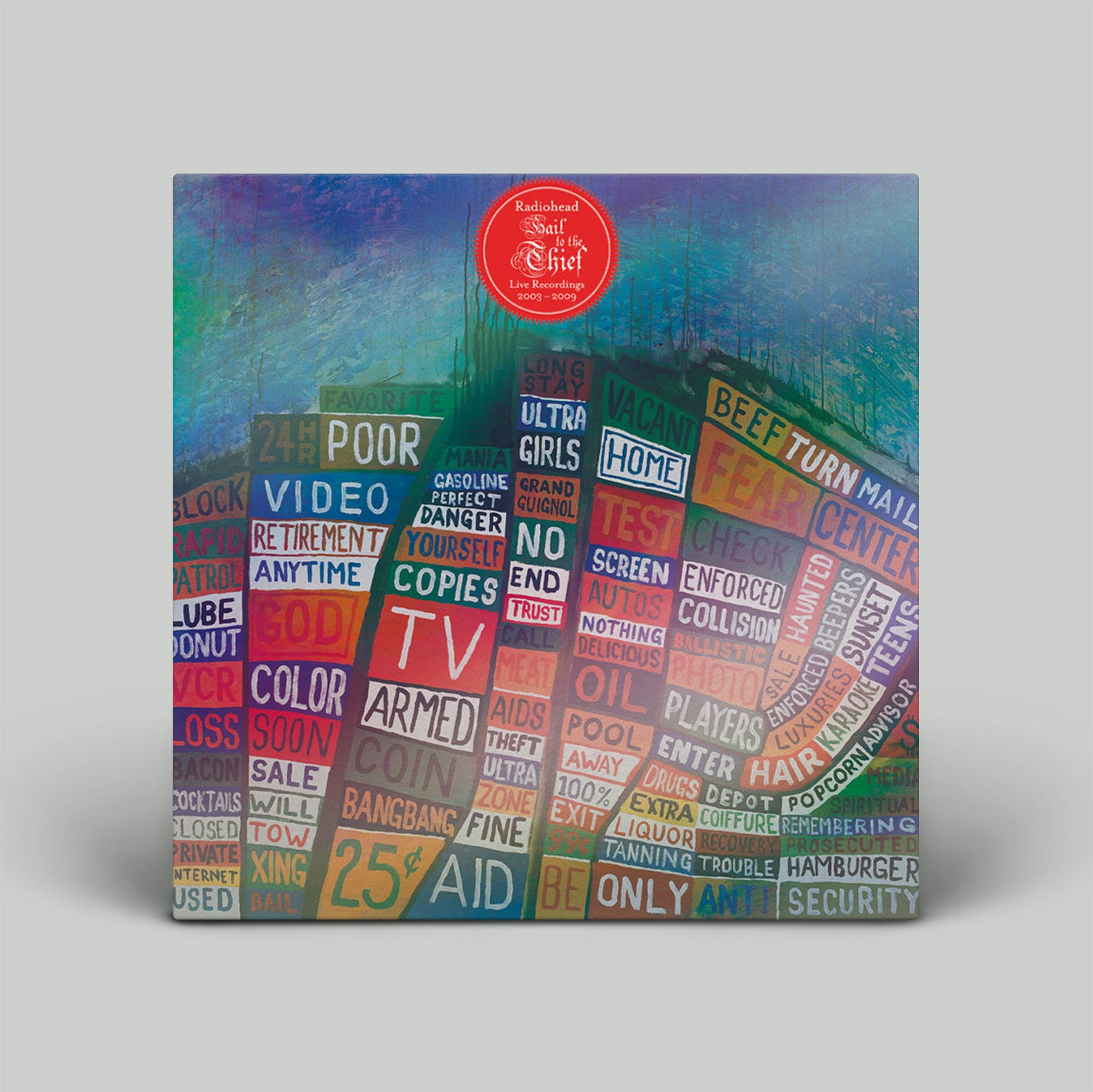 Colorful vinyl record cover with text and a red label on a gray background