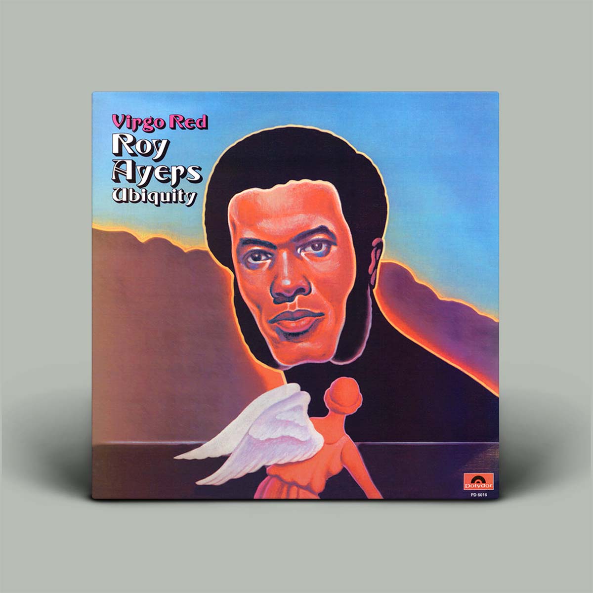 Vinyl record cover with a stylized portrait and abstract design on a gray background