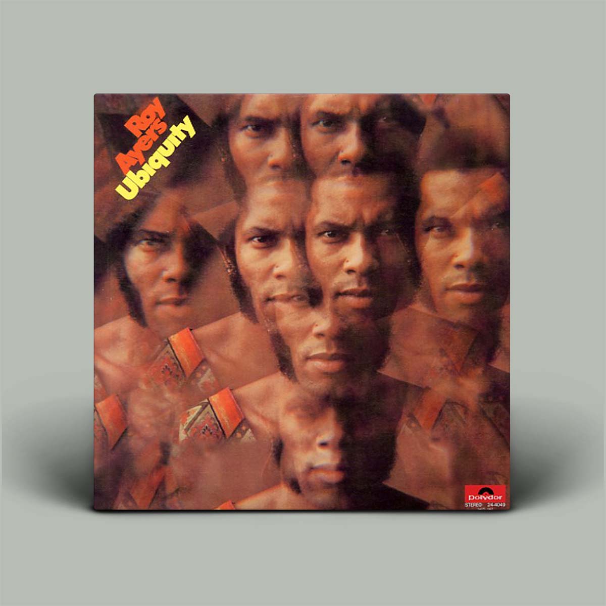 Album cover with photograph of multiple faces.