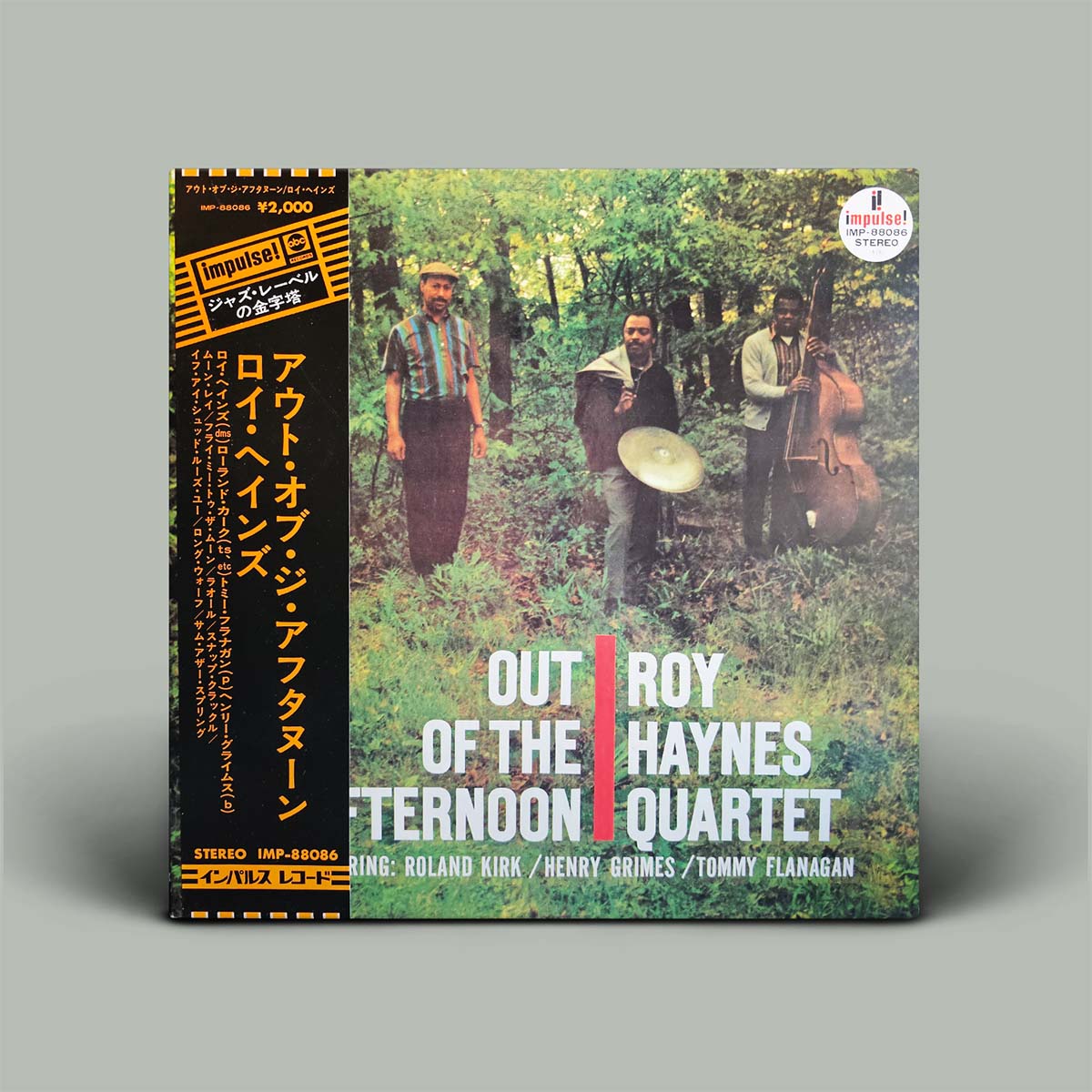 Impulse! Records' Japanese import of Roy Haynes' 'Out of the Haynes' quartet, featuring a black-and-yellow spine and a green-toned cover photo of the band in a forest.