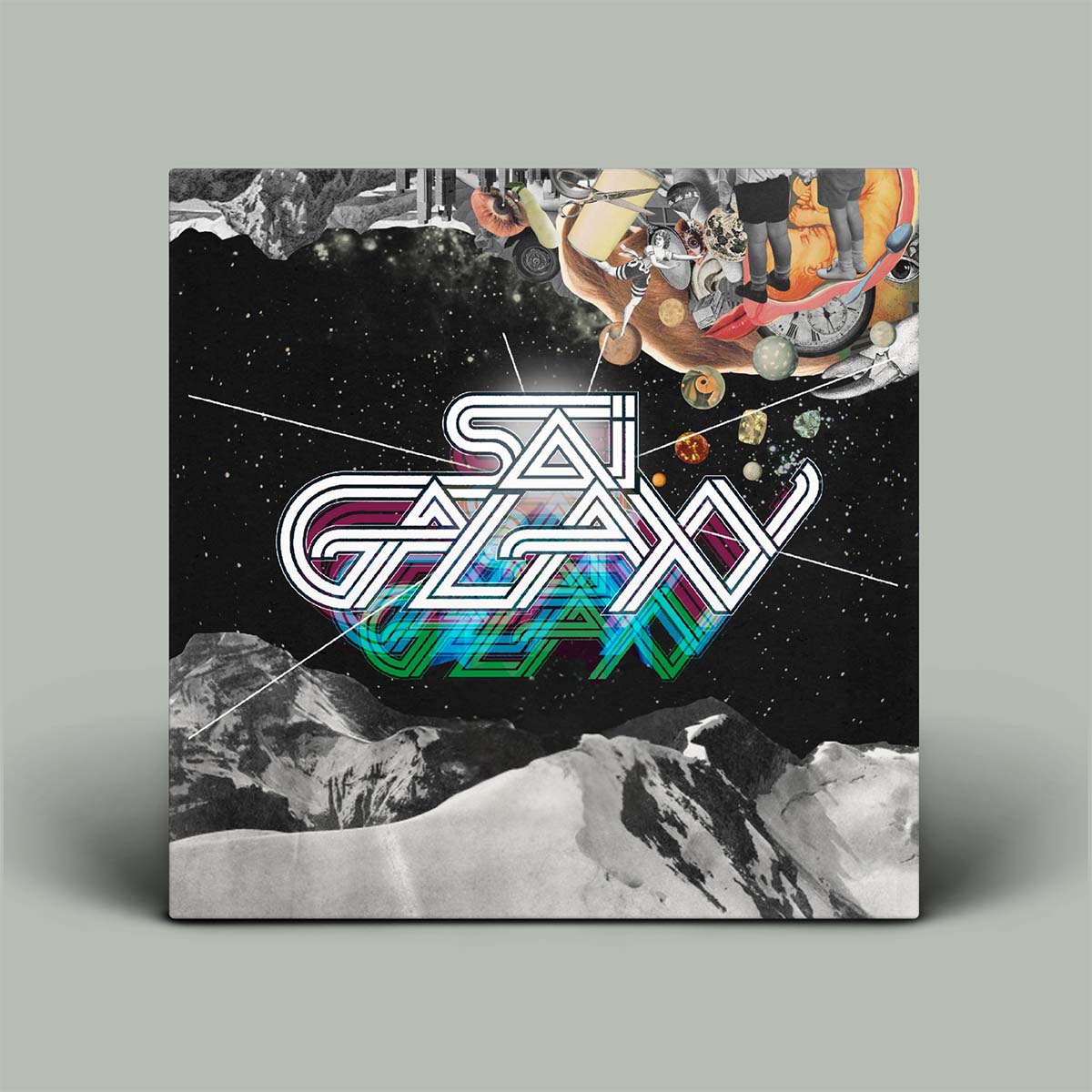 A square album cover featuring the stylized text 'Sai Gyan' over a space-themed collage with planets, mountains, and a black starry background, shown against a light gray backdrop.