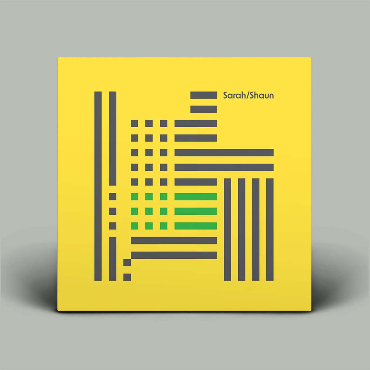 Yellow album cover with geometric patterns and 'Sarah/Shaun' text on a gray background