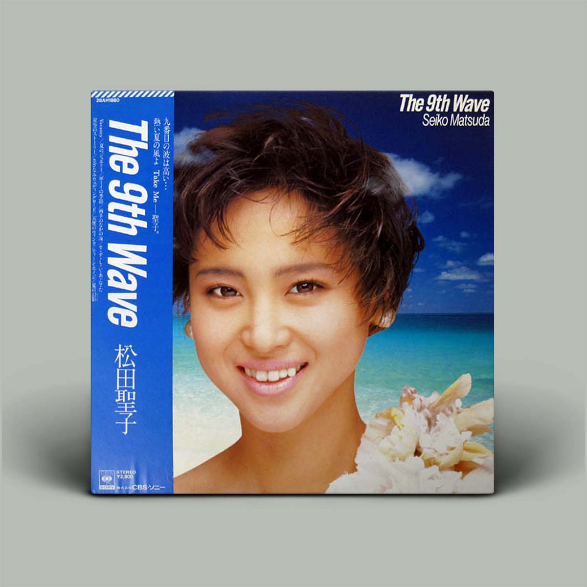 Album cover for 'The 9th Wave' by Seiko Matsuda with a beach scene and blue sky.