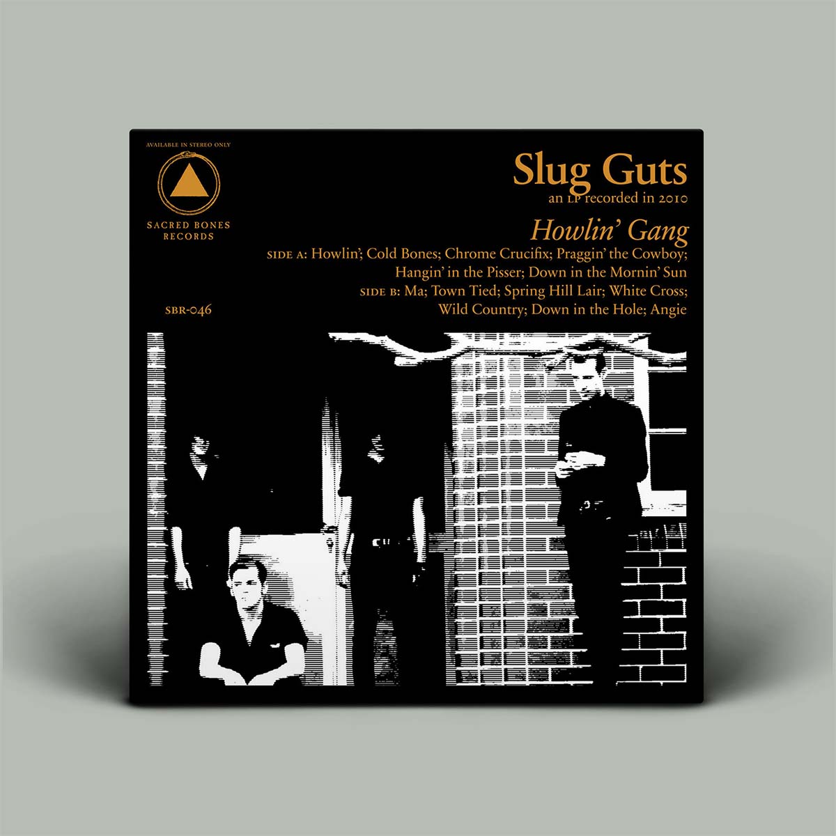 Vinyl record cover with black and white photo of people and text on a gray background