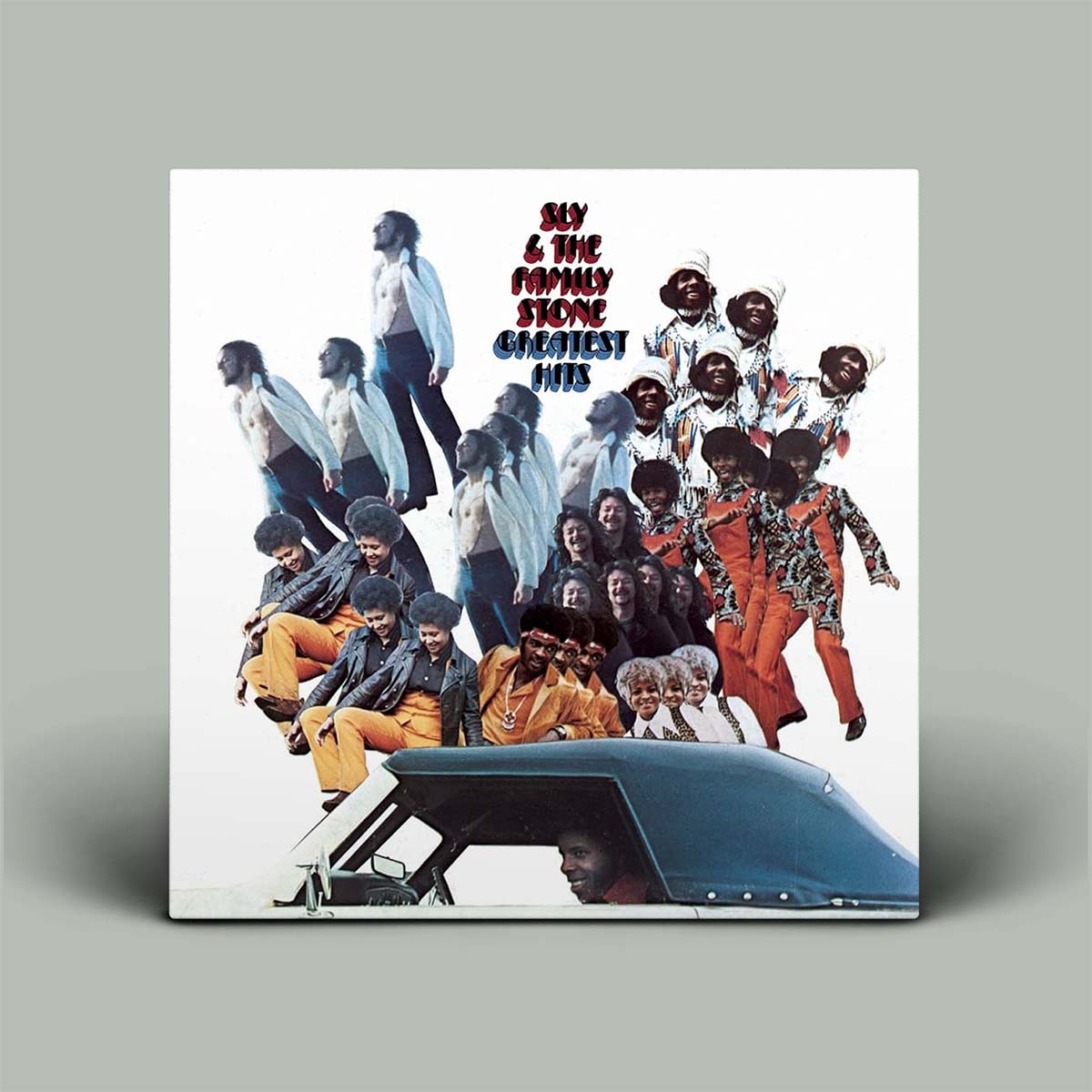 Album cover of Sly & the Family Stone's 'Greatest Hits' with a group photo and car on a white background.