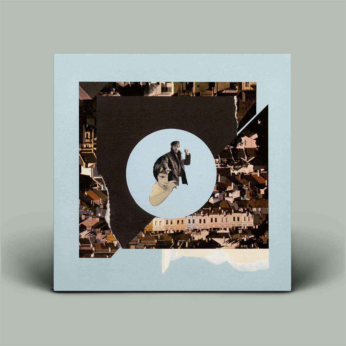 Light blue album cover with graphic image in the middle 