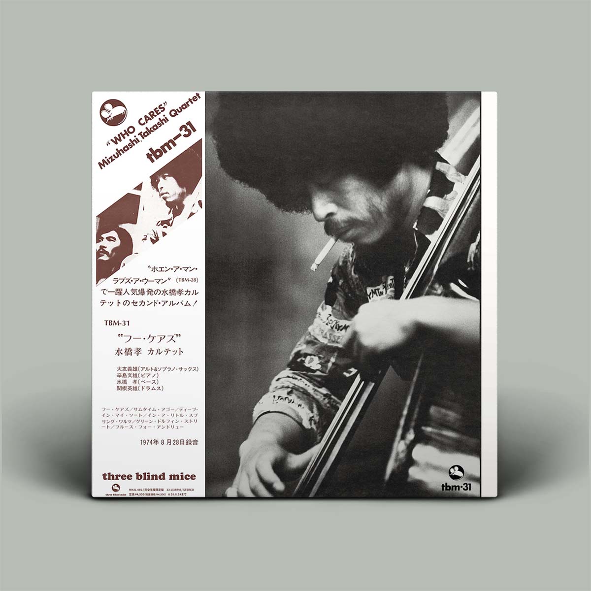 Album cover featuring a musician playing the bass with text and branding on the left side.