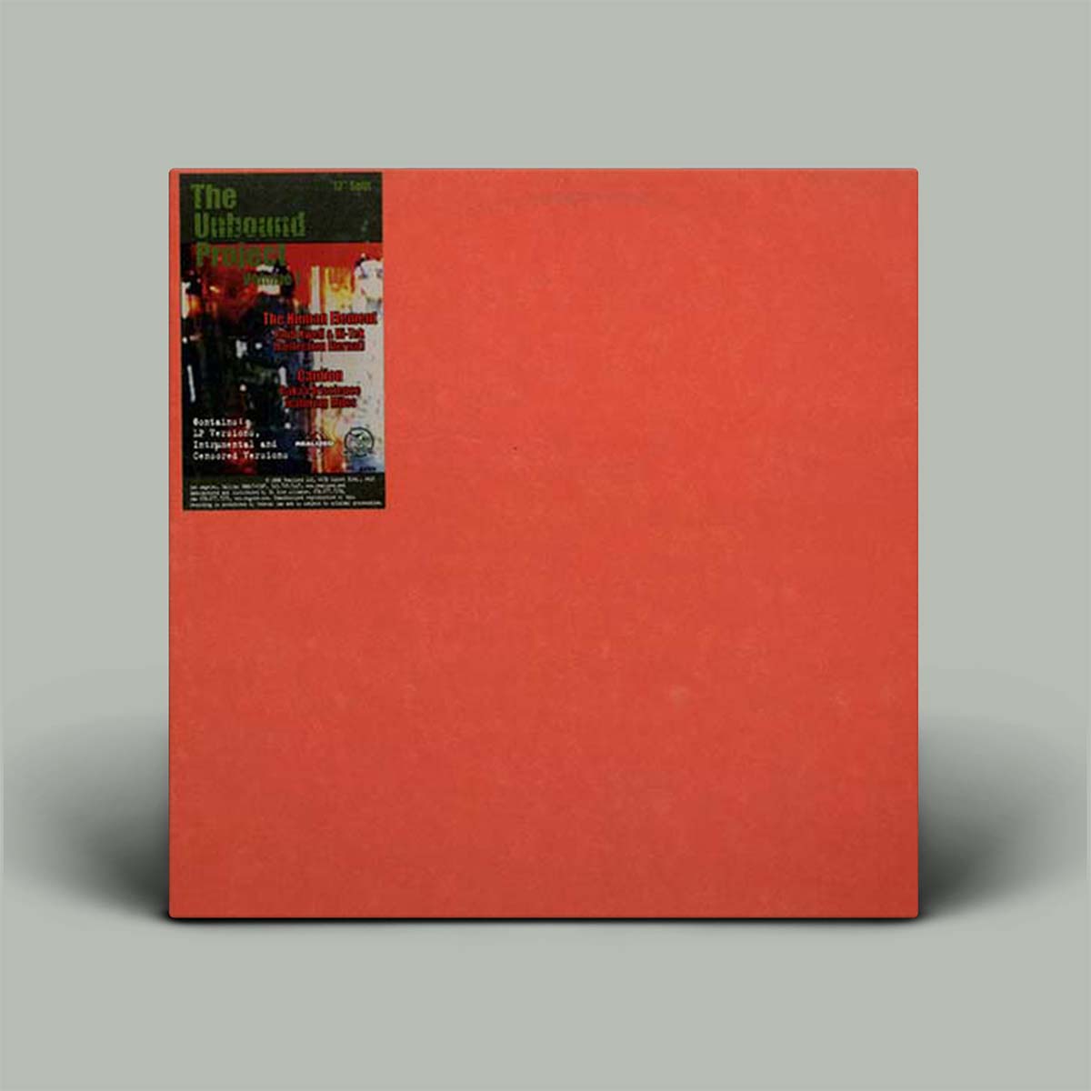 Red album cover with a smaller black label on a gray background